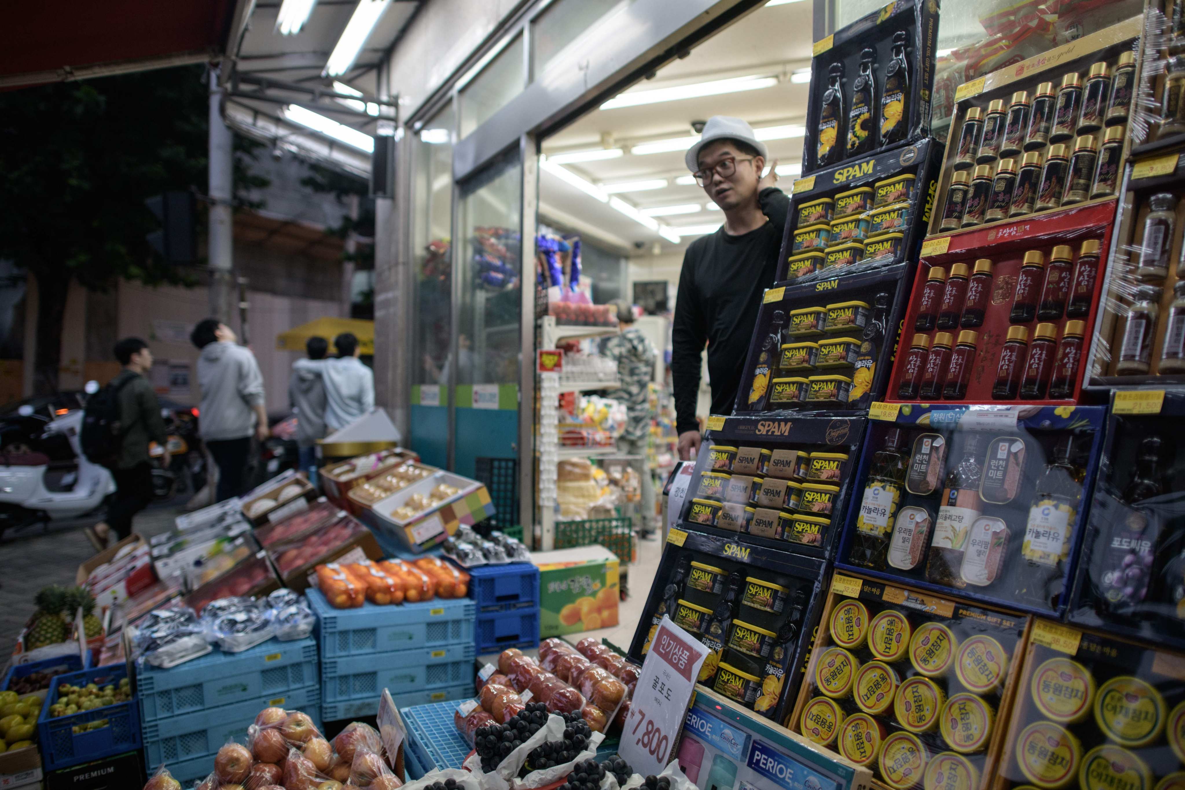 Fresh fruit and canned goods on display outside a supermarket in Seoul. Skyrocketing food inflation is a key concern for many South Korean voters. Photo: AFP
