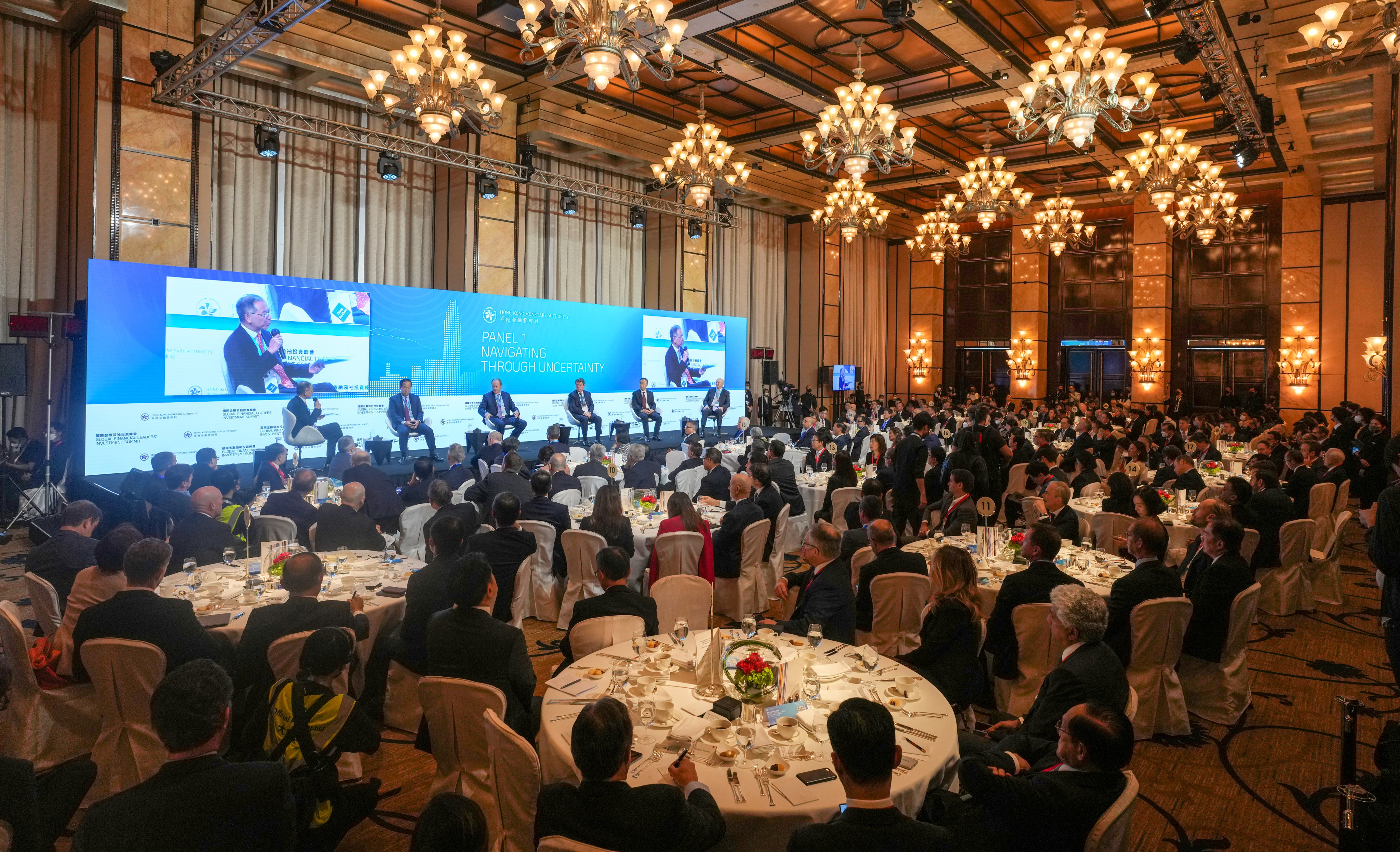 Eddie Yue, CEO of the Hong Kong Monetary Authority, speaks with executives from Blackstone, Morgan Stanley, UBS Group, Bank of China and Goldman Sachs at the Global Financial Leaders’ Investment Summit at Four Seasons hotel in Central, Hong Kong on November 2, 2022. Photo: Sam Tsang