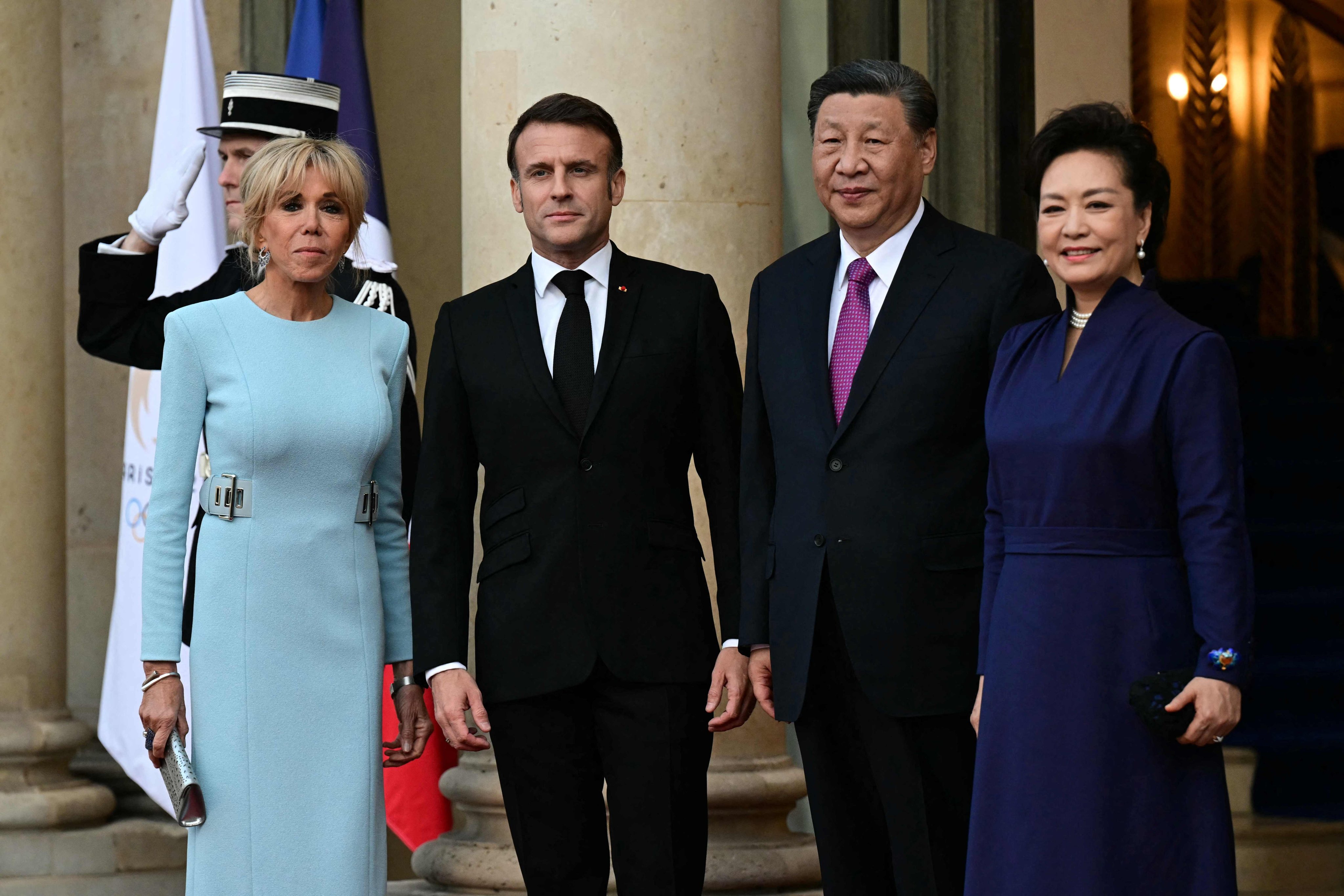 French President Emmanuel Macron and his Chinese counterpart Xi Jinping, flanked by first ladies Brigitte Macron (left) and Peng Liyuan (right), before Monday’s official state dinner at the Elysee Palace in Paris. Photo: AFP