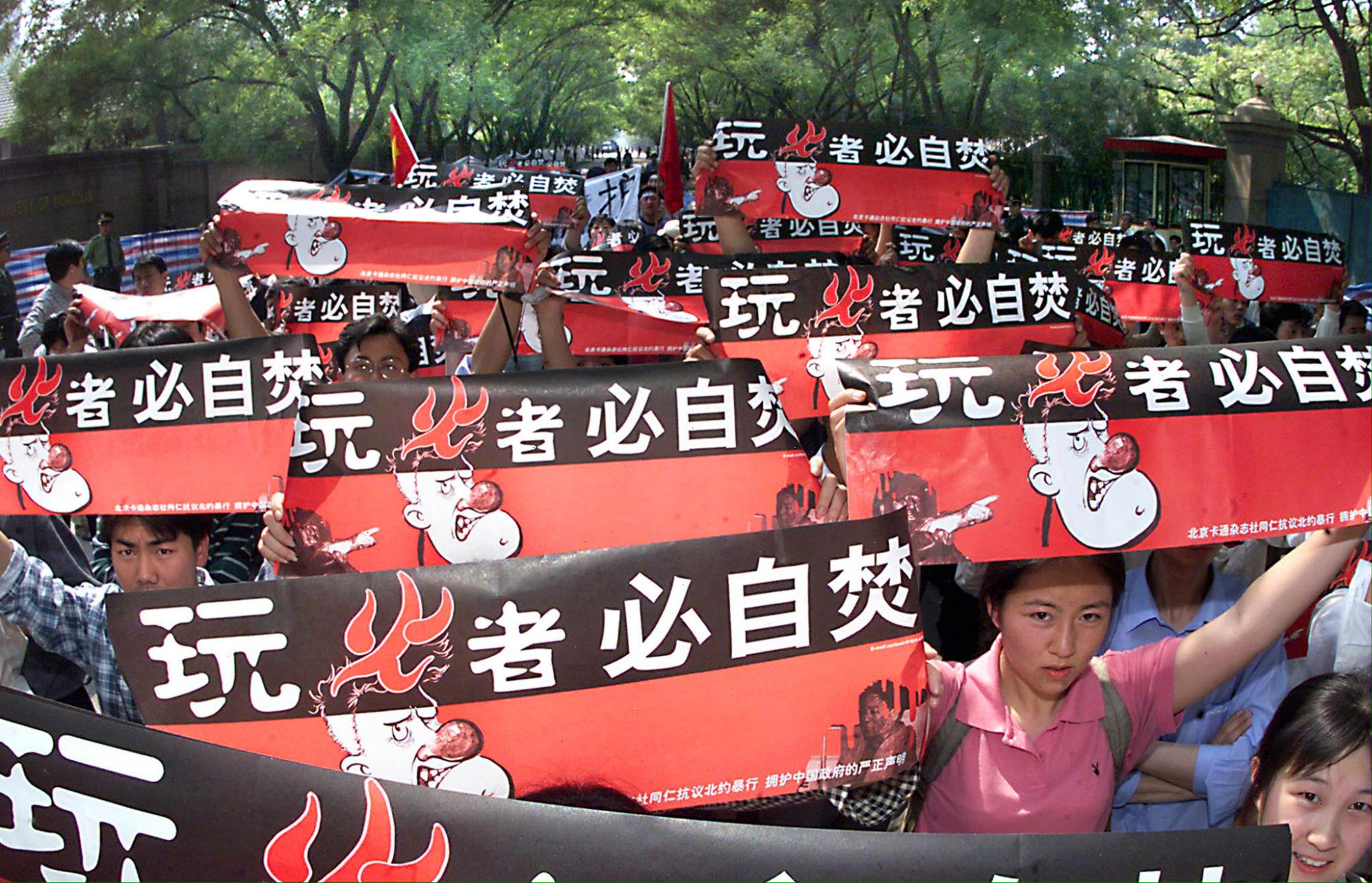 After the 1999 airstrike on the Chinese embassy as part of Nato’s campaign against the former Yugoslavia, protesters marched on the US embassy in Beijing, with banners warning then president Bill Clinton that “those who play with fire get burned”. Photo: AFP