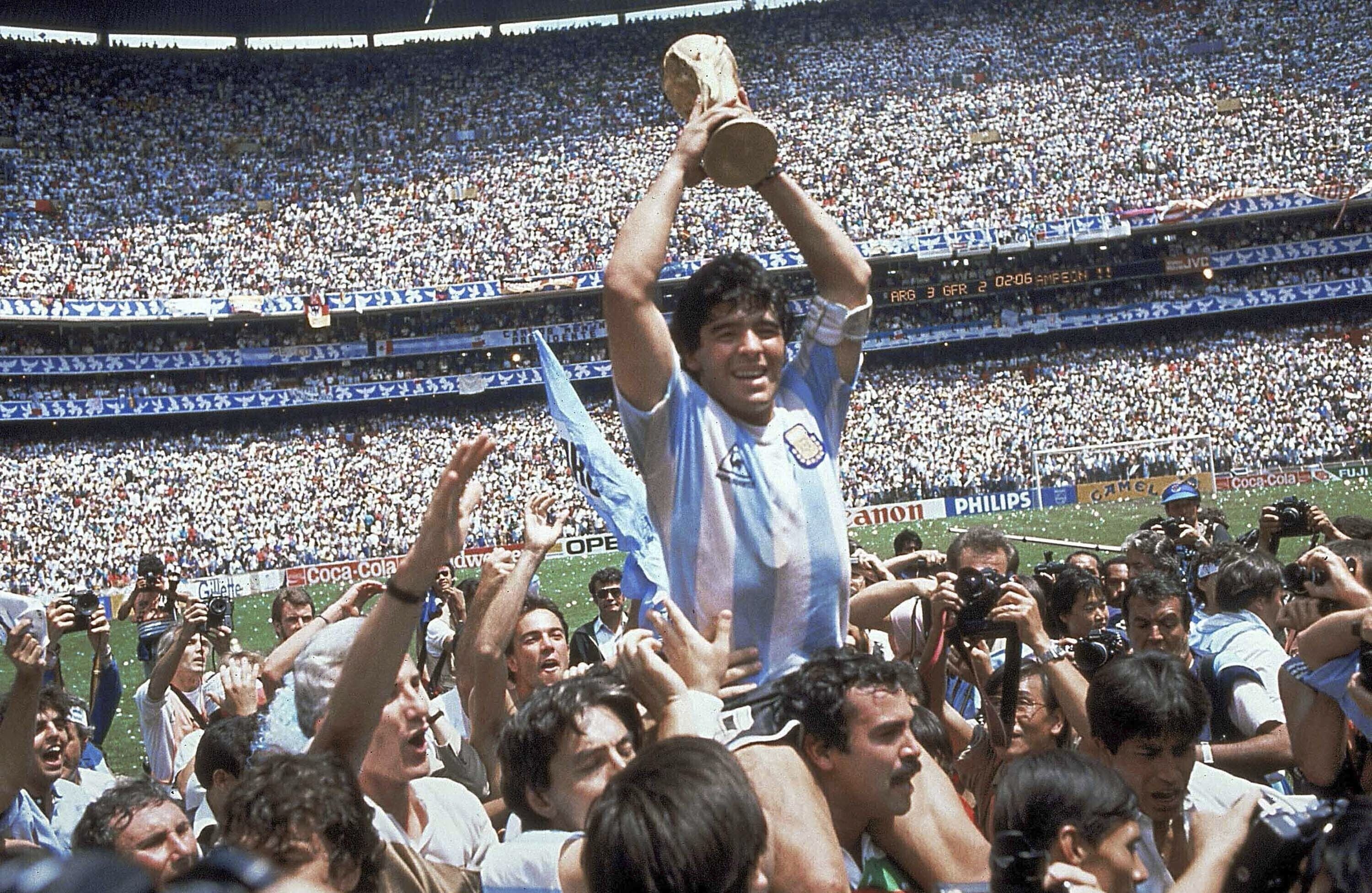 Diego Maradona holds up the World Cup after Argentina’s 3-2 over West Germany in the final at Azteca Stadium in Mexico City. Photo: AP
