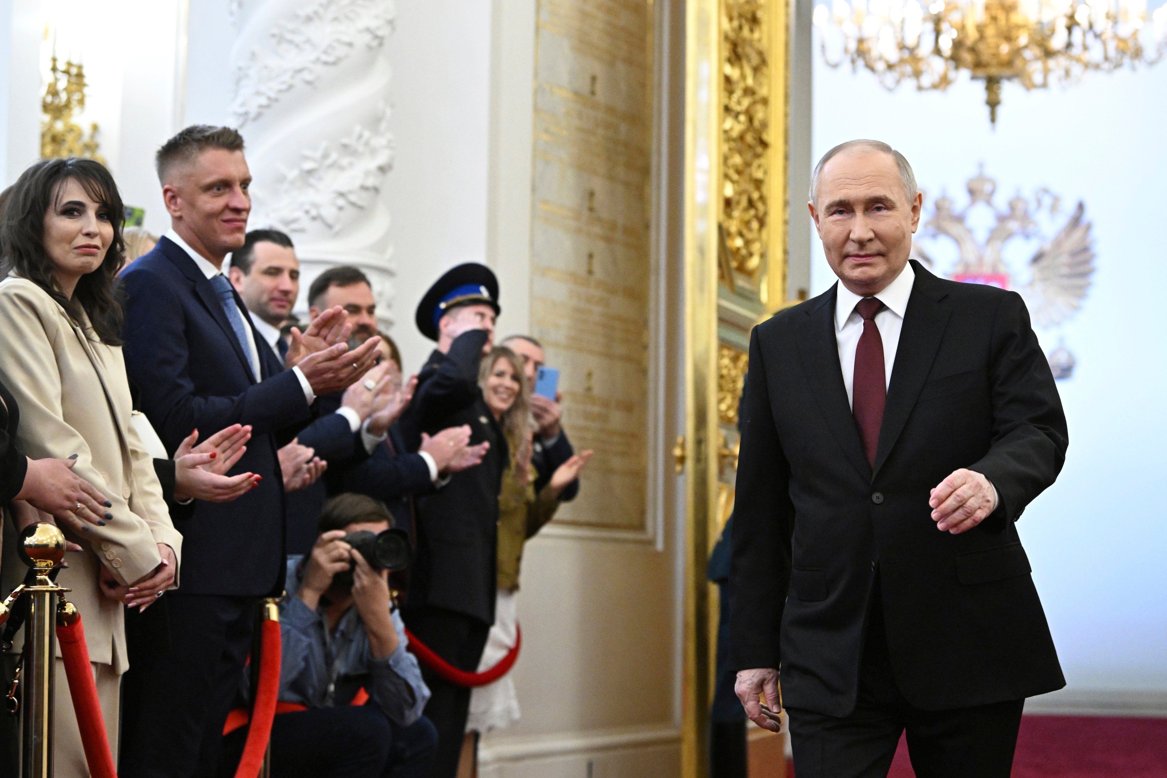Vladimir Putin arrives for an inauguration ceremony to begin his fifth term as Russian president in the Grand Kremlin Palace in Moscow on Tuesday. Photo: Sputnik, Kremlin Pool Photo via AP