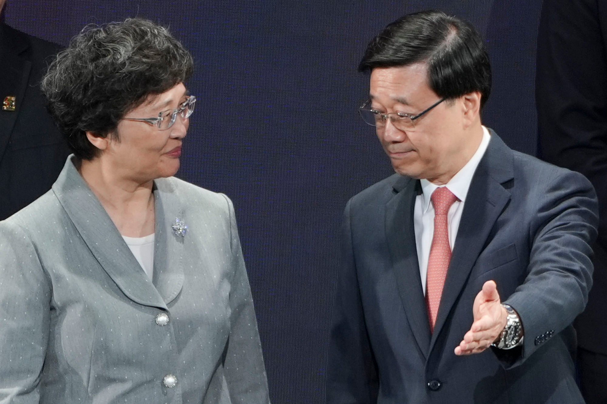 Wang Xiaoping (left), the country’s human resources and social security minister, and Hong Kong leader John Lee are attending the Global Talent Summit. Photo: Eugene Lee