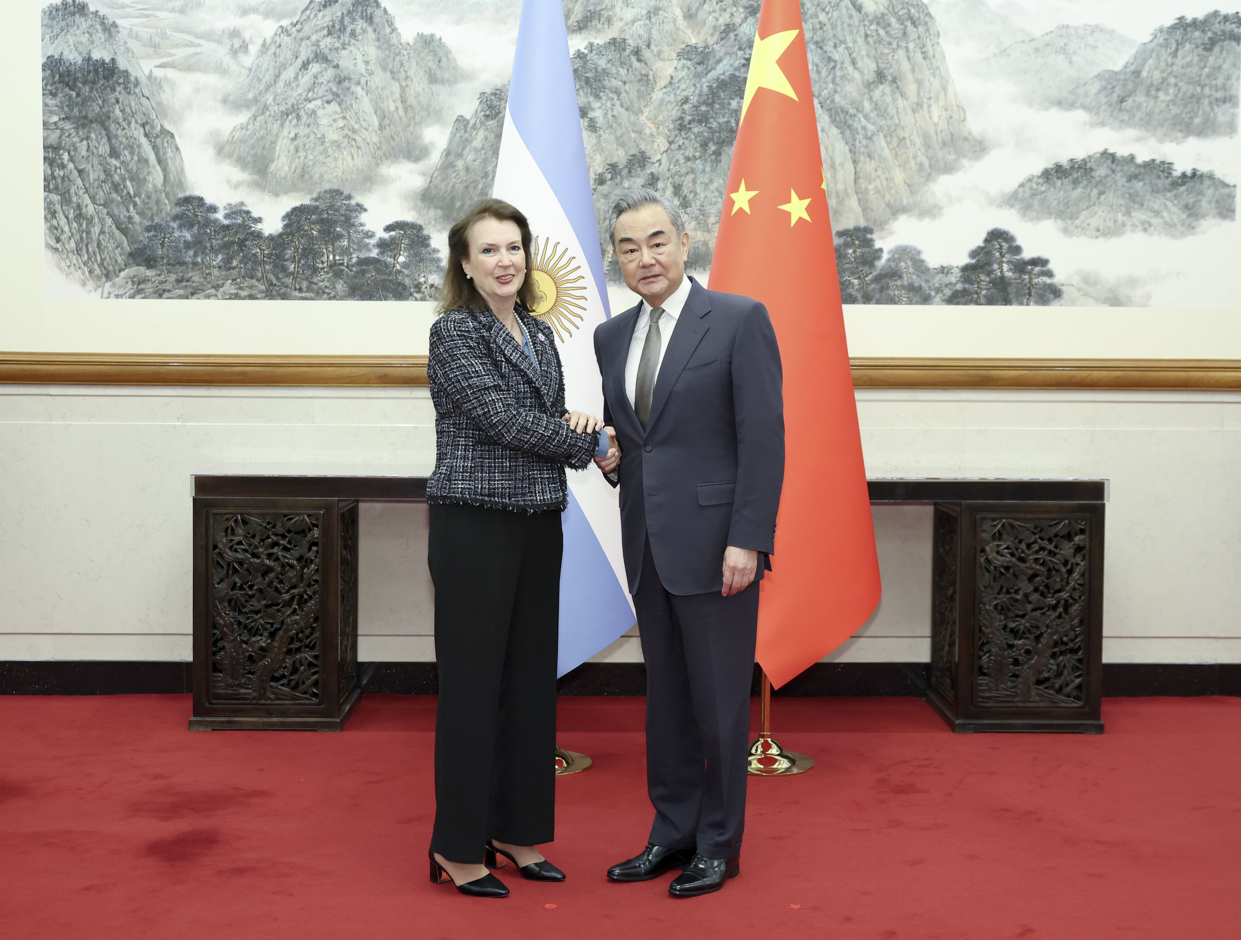 Argentina’s foreign minister Diana Mondino shakes hands with her Chinese counterpart Wang Yi during a meeting in Beijing on April 30, 2024. Photo: Xinhua
