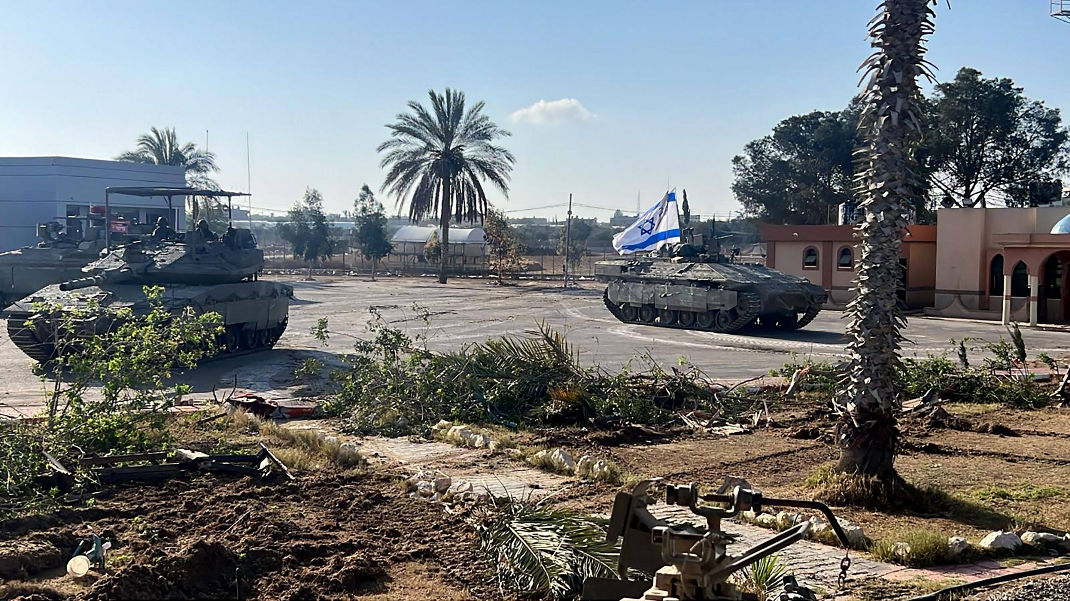 Israeli tanks entering the Palestinian side of the Rafah border crossing between Gaza and Egypt. Photo: Israeli Army via AFP