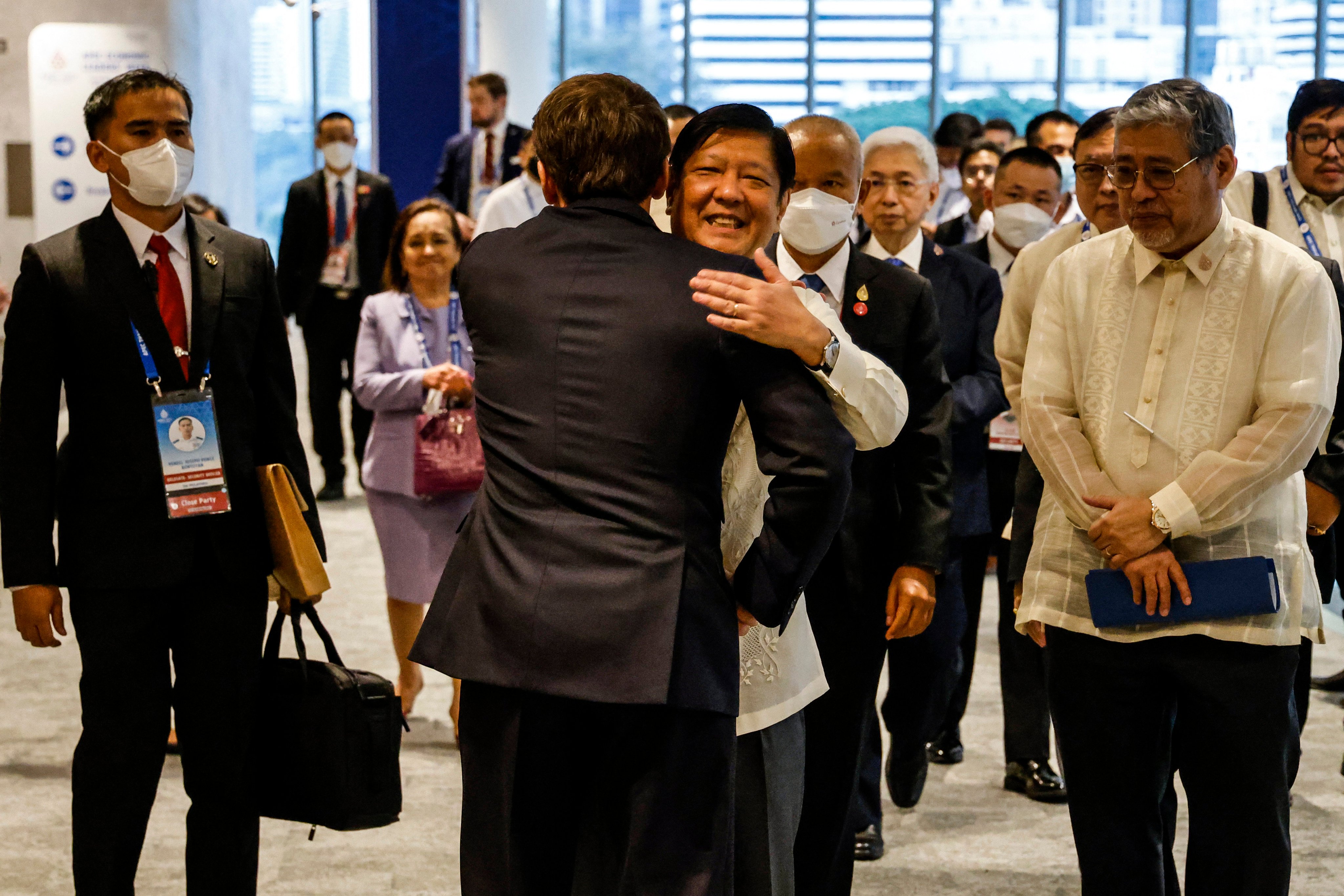 Philippine President Ferdinand Marcos Jnr hugs French President Emmanuel Macron on the sidelines of an Apec summit in 2022. Photo: AFP
