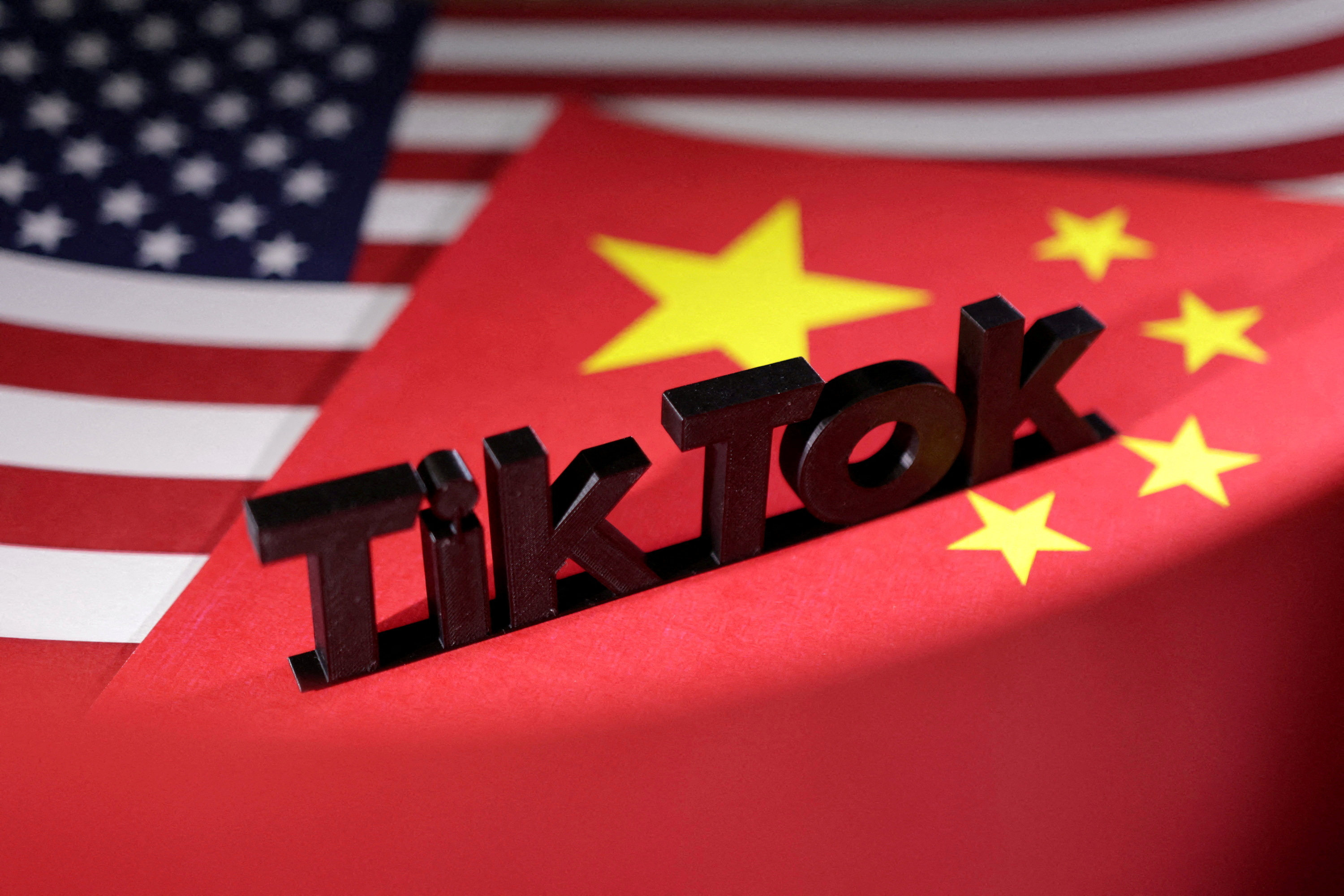The lawsuit says the Chinese government “has made clear that it would not permit a divestment of the recommendation engine that is a key to the success of TikTok in the United States”. Photo illustration: Reuters