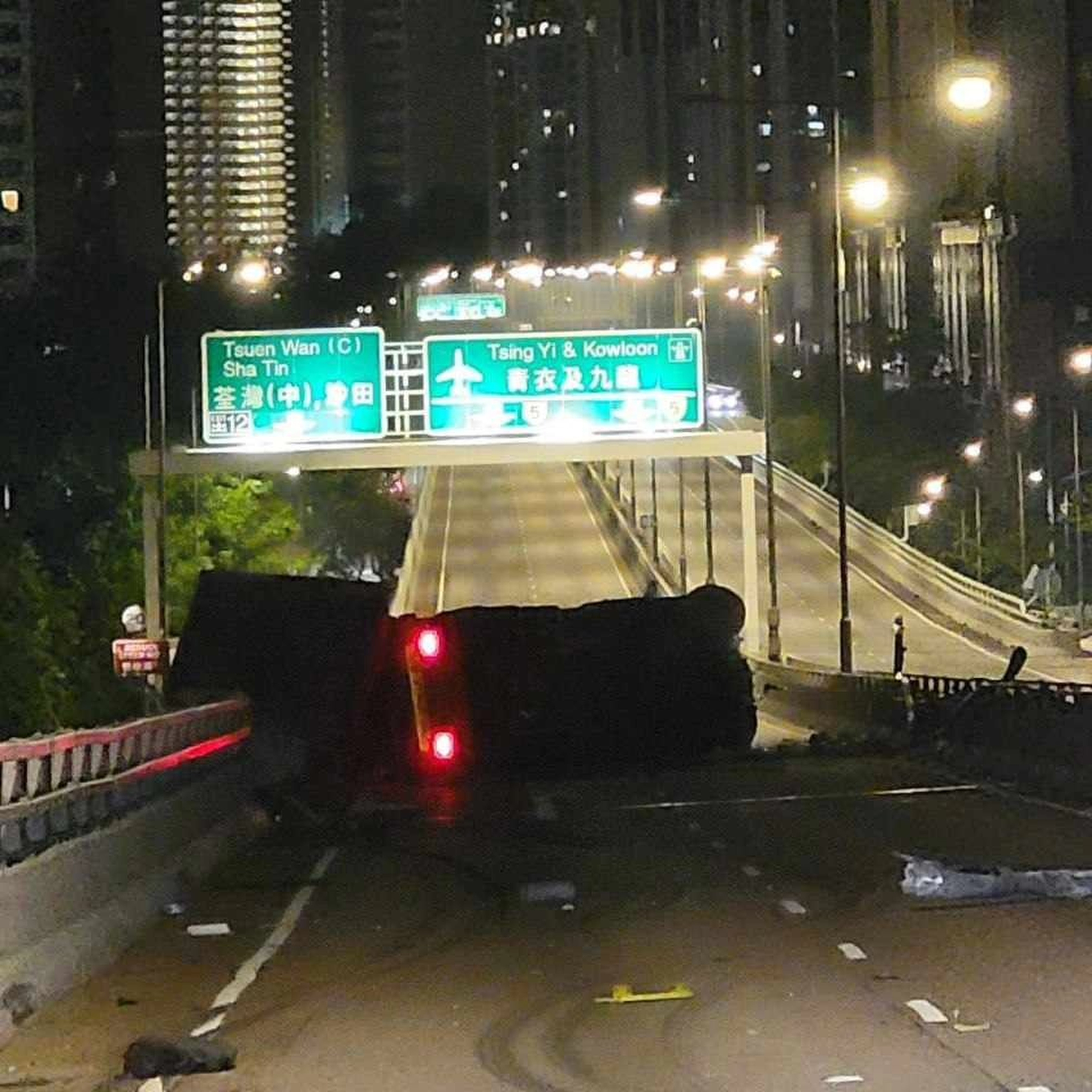 A 66-year-old driver died after his container truck flipped over on Tsuen Wan Road flyover. Photo: Facebook/Bosco Chu