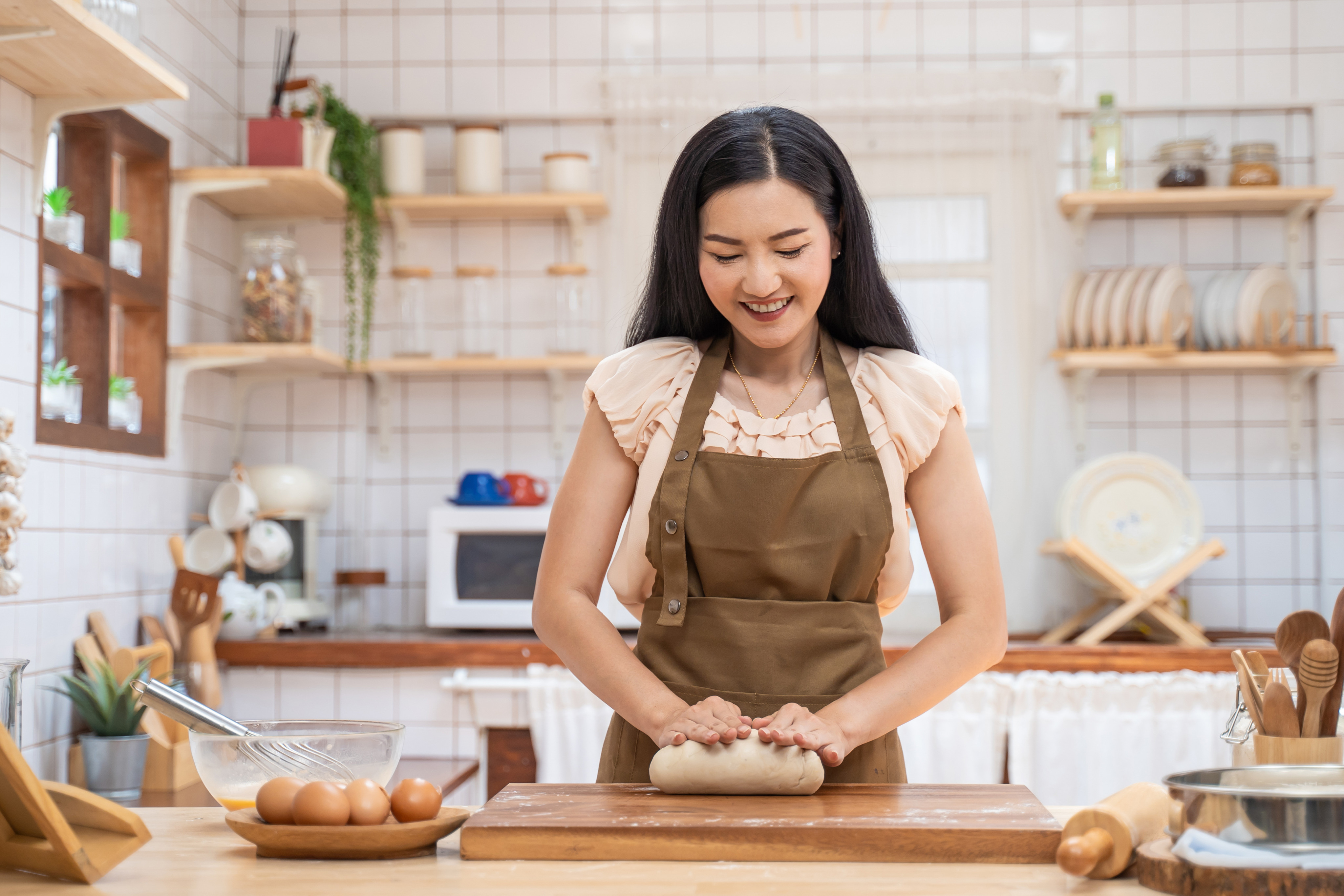 Baking at home is one way people might enjoy JOMO, or the joy of missing out. Photo: Shutterstock