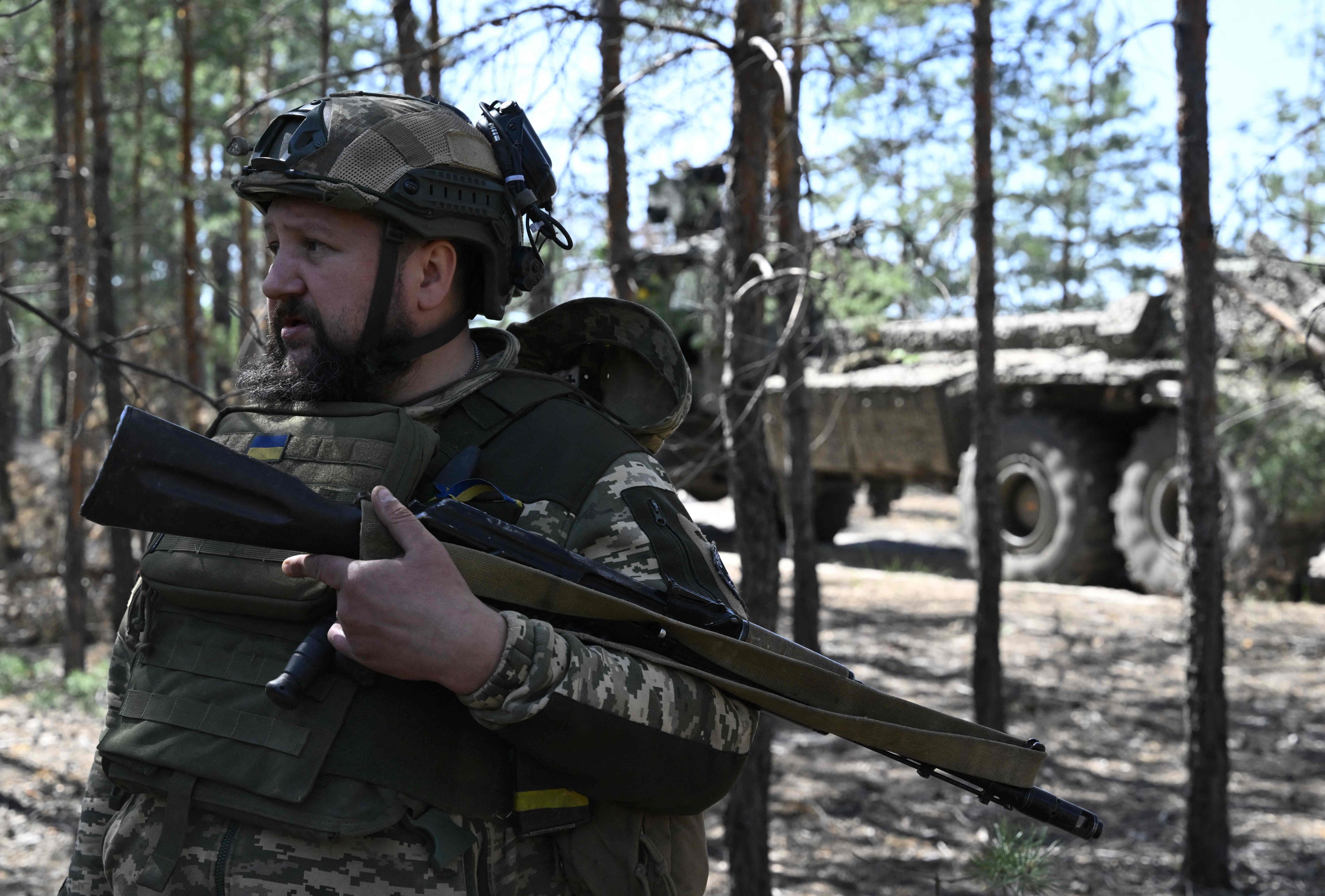 A Ukrainian serviceman waits in a forest for orders amid the Russian invasion of Ukraine. Photo: AFP