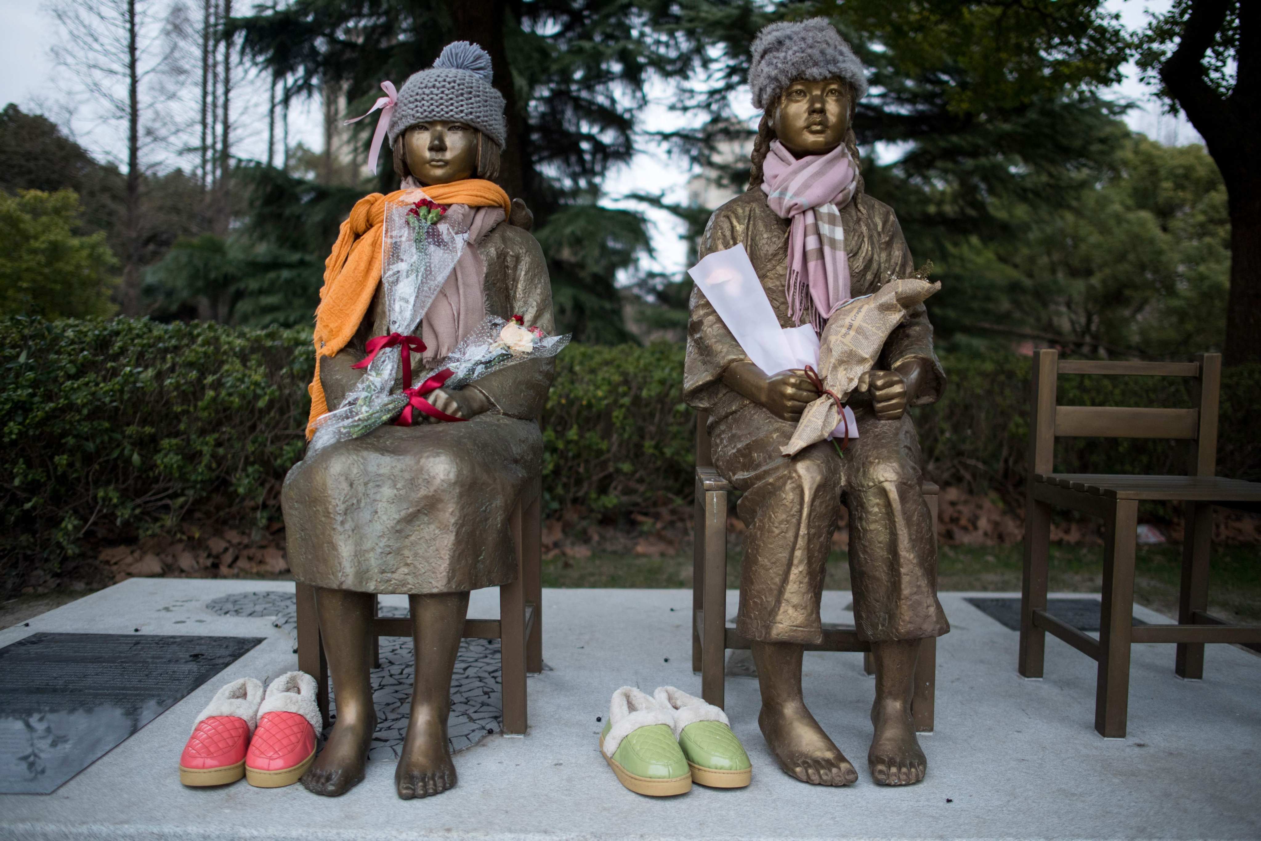 Two statues symbolising “comfort women” at a park in Shanghai. The Chinese government’s attitude to the issue of justice for the women forced by the Japanese military to work in wartime brothers has been seen as ambiguous. Photo: AFP