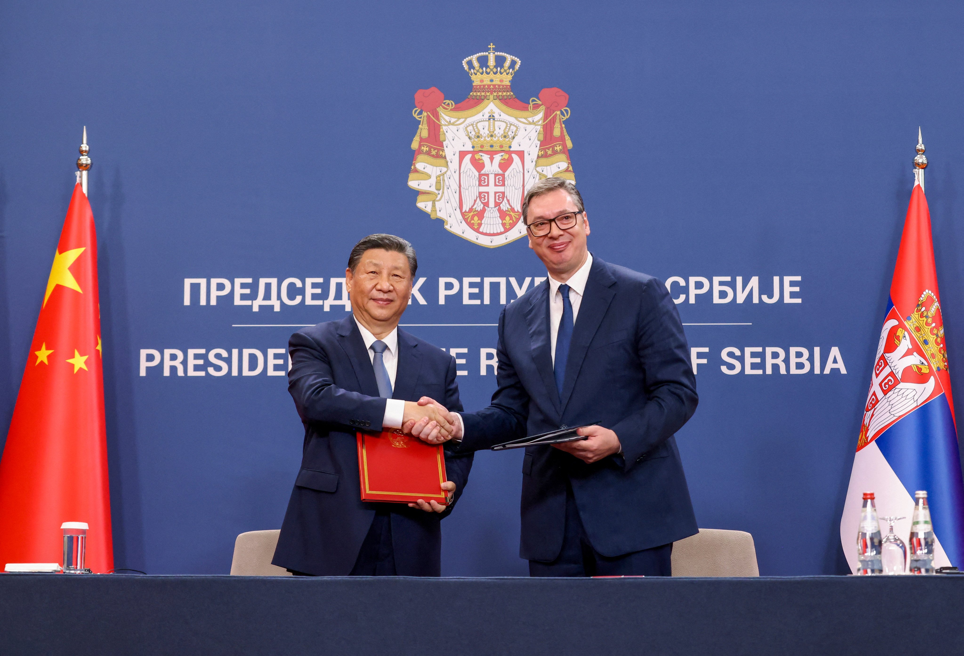 Serbian President Aleksandar Vucic and Chinese President Xi Jinping shake hands during their meeting on Wednesday morning. Photo: Reuters