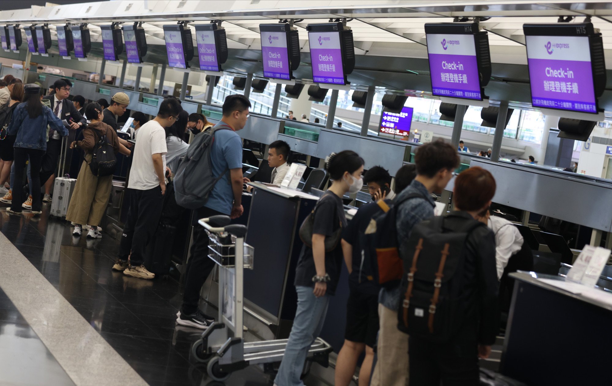 Cathay Pacific s HK Express to charge fliers for carry on suitcase option under new baggage policy South China Morning Post