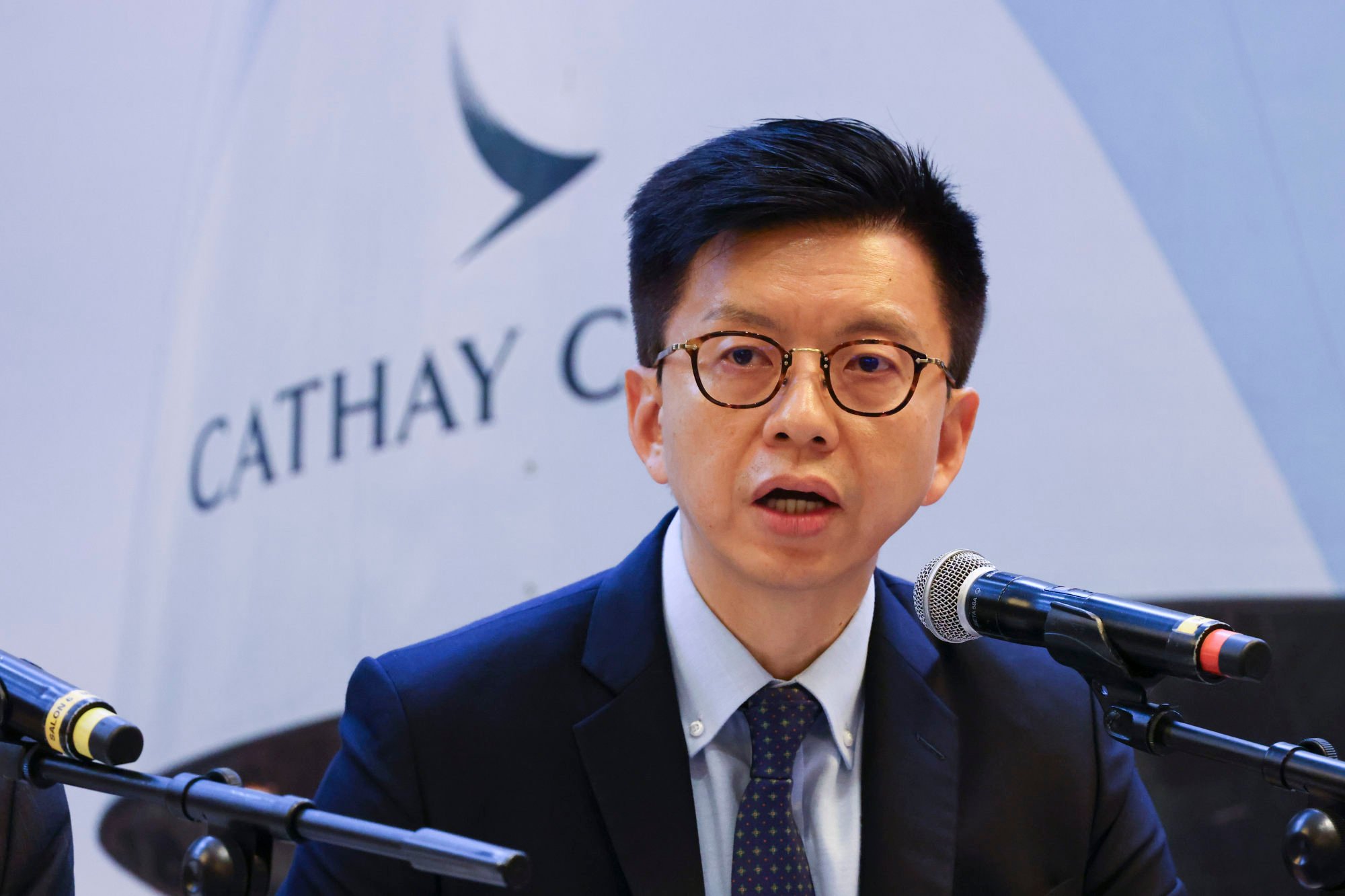 Cathay Pacific’s HK Express to charge fliers for carry-on suitcase ...