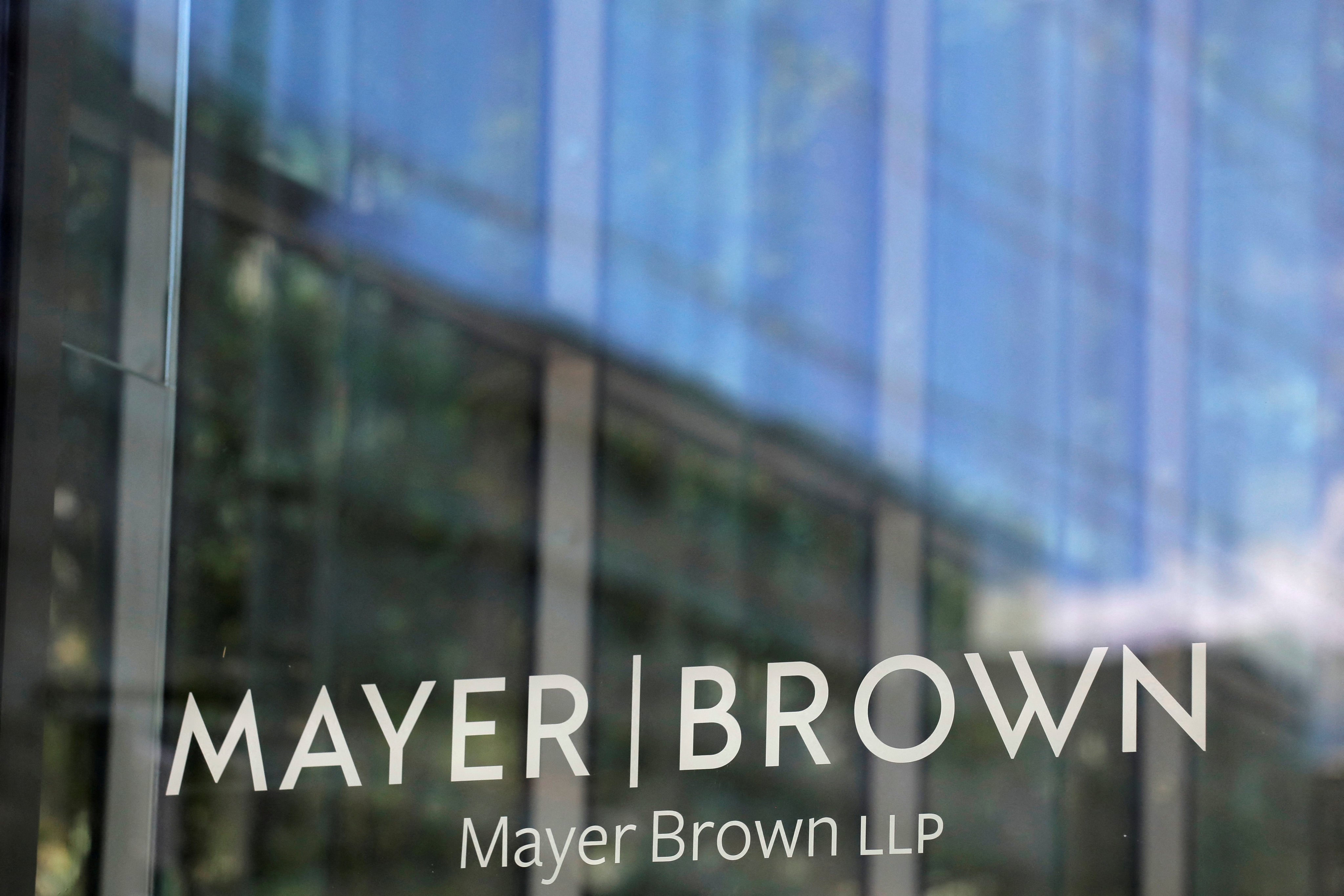 Signage of the US law firm Mayer Brown is seen outside its office in Washington, DC, in 2020. The firm, which has announced a split from its Hong Kong partners, will continue to operate in Hong Kong through a new partnership that aligns with its strategic priorities. Photo: Reuters