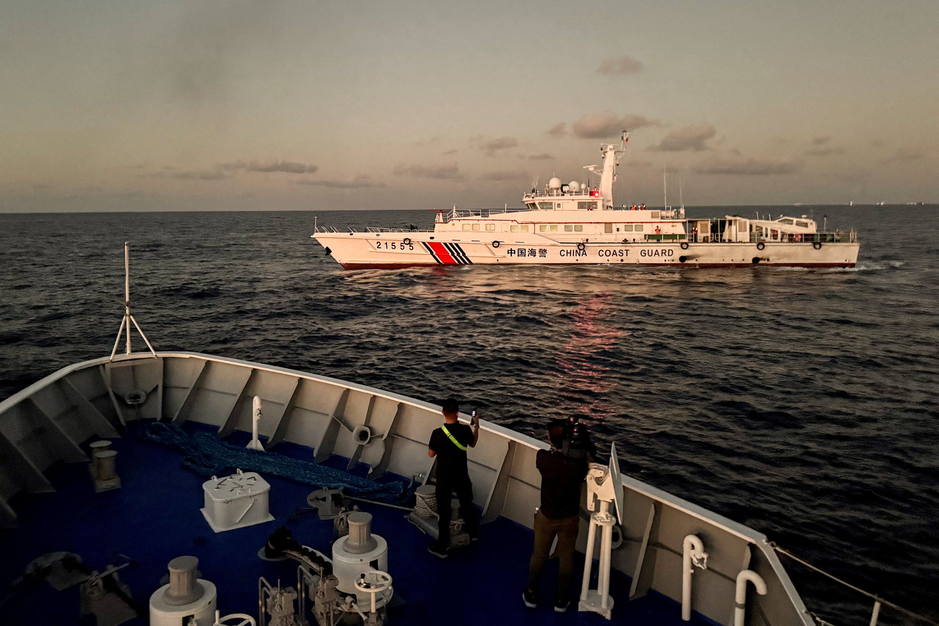 A Chinese coastguard vessel blocks a Philippine coastguard ship on its way to a resupply mission at Second Thomas Shoal in the disputed South China Sea. Photo: Reuters