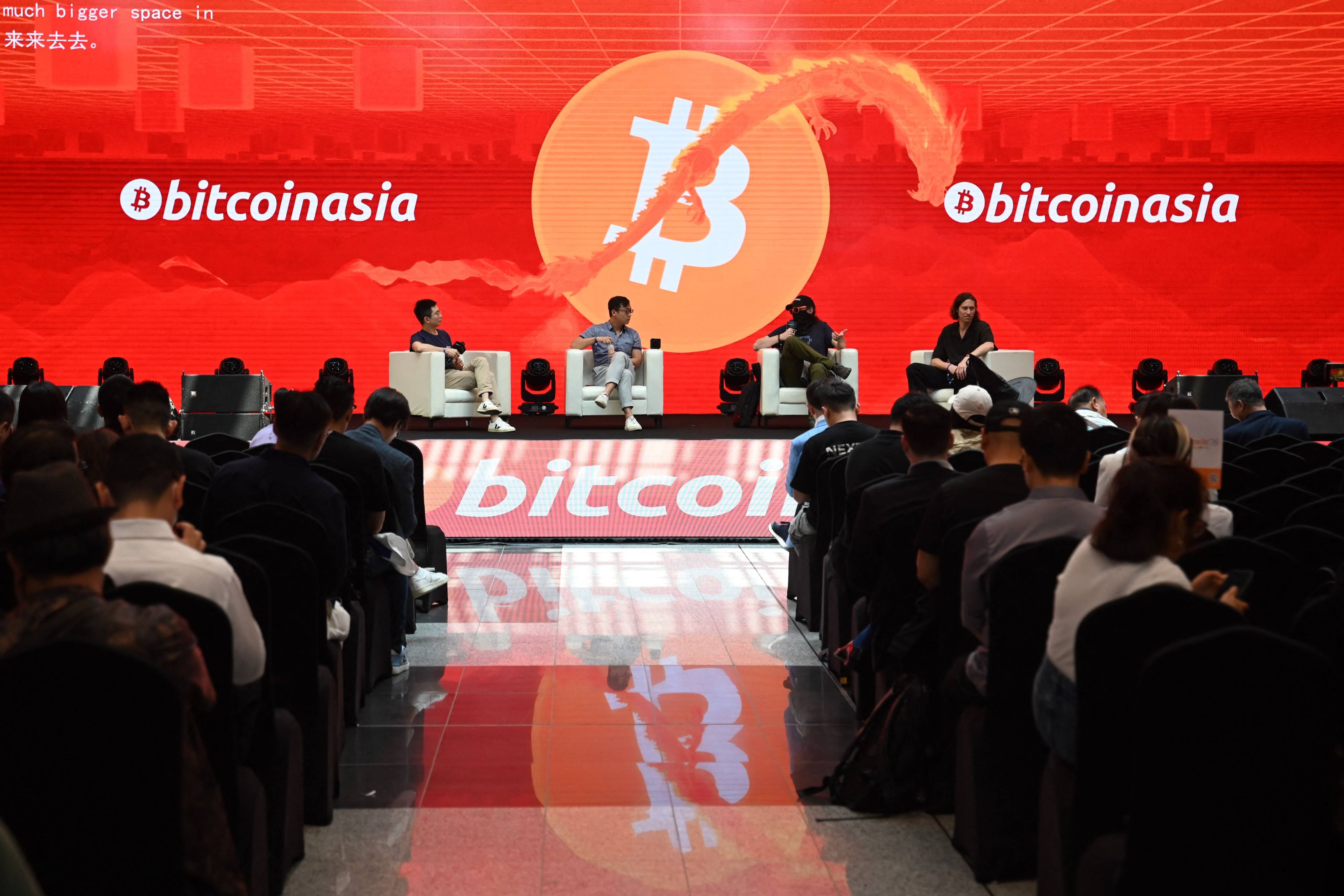Visitors attend the Bitcoin Asia conference in Hong Kong on May 9, 2024. Photo: AFP