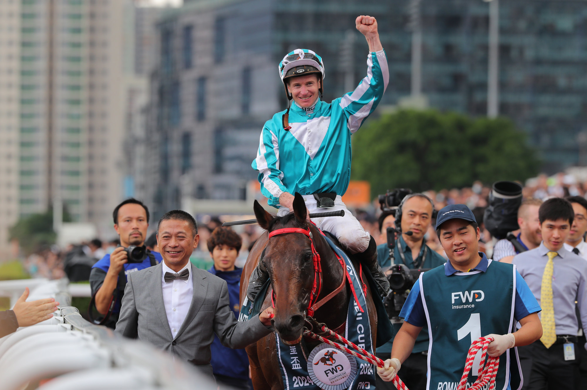 Danny Shum with Romantic Warrior after his brave QE II Cup win.
