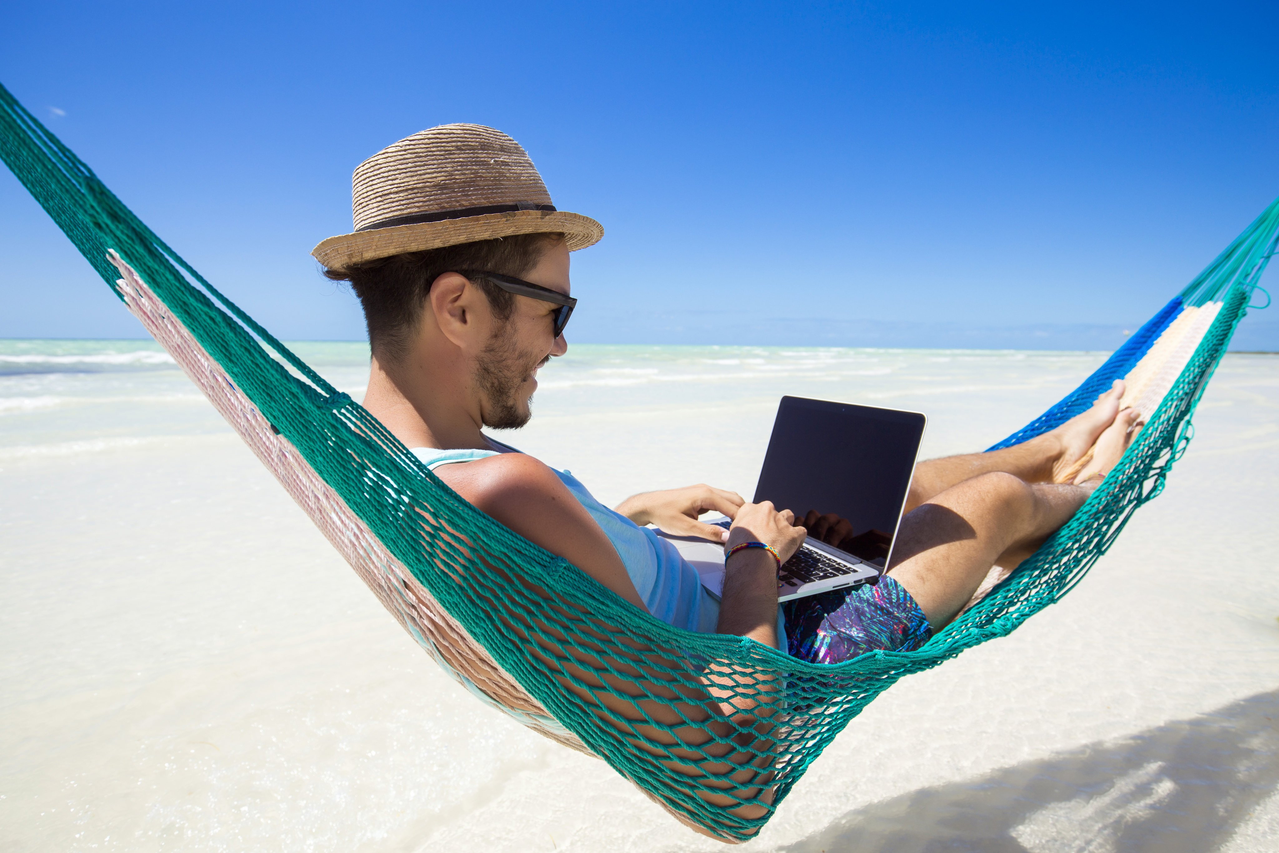 Working from a beach in Bali will seem less of an impossible dream for hundreds of thousands of Singaporeans from December, when new flexitime guidelines kick in. Photo: Shutterstock 