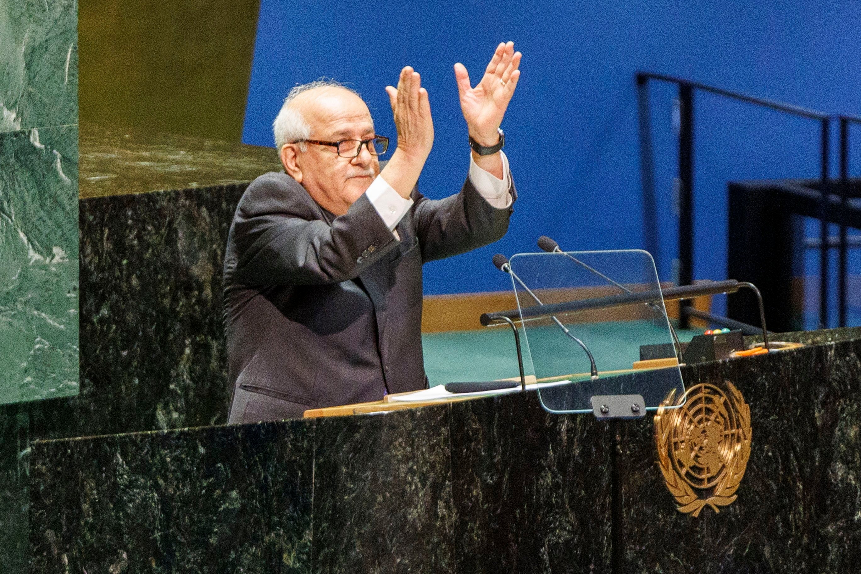 Permanent Observer of Palestine to the UN Riyad Mansour claps as the crowd reacts to his speech at the United Nations General Assembly  in New York on Friday. Photo: EPA-EFE