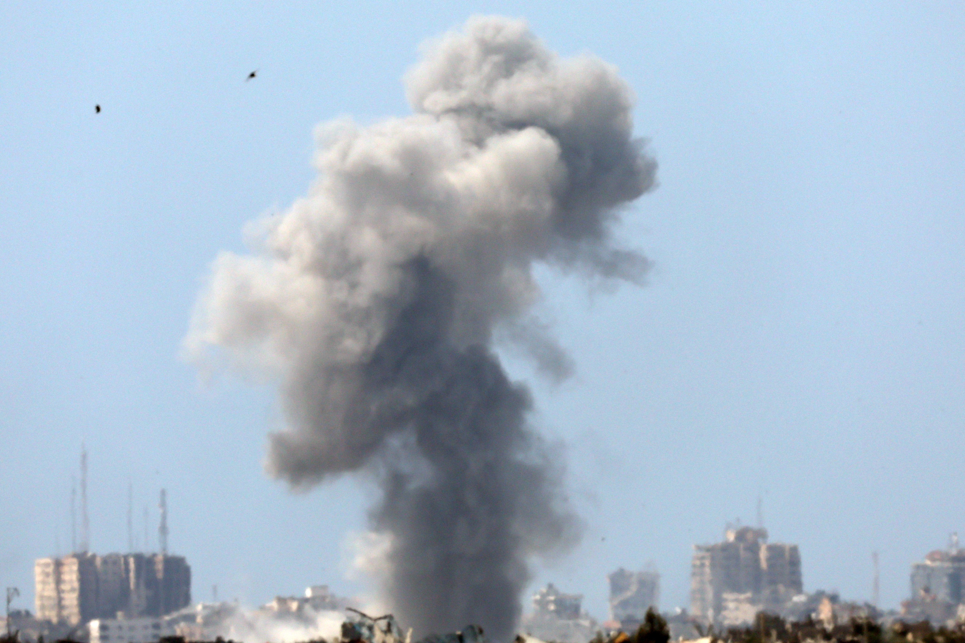 Smoke rises after an Israeli air strike in northern Gaza, as seen from the Israeli side of the border in southern Israel on Sunday. The Israeli military said on Sunday that a leading  Hamas member was killed in an air strike in Gaza on Friday. Photo: EPA-EFE