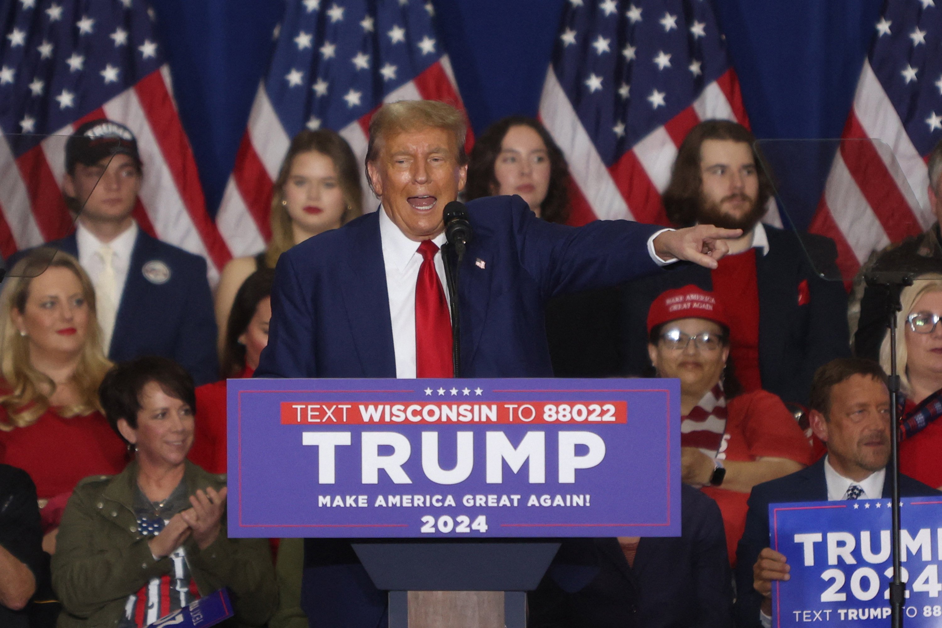 Donald Trump speaks during a campaign rally in Green Bay, Wisconsin. The former US president says Chinese migrants are in US to build an ‘army.’ Photo: TNS