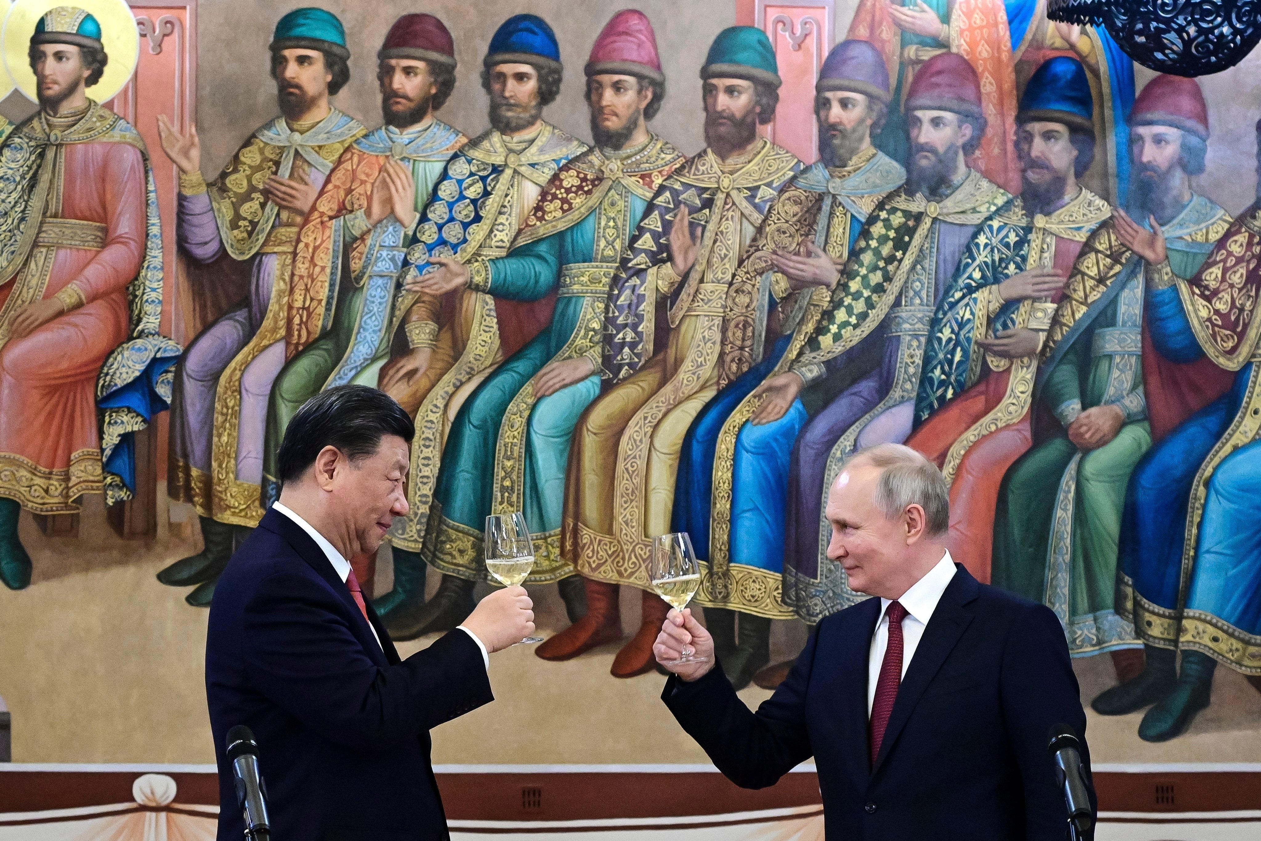 Russian President Vladimir Putin and his Chinese counterpart Xi Jinping raise a toast at the Kremlin in March last year. Photo: AP