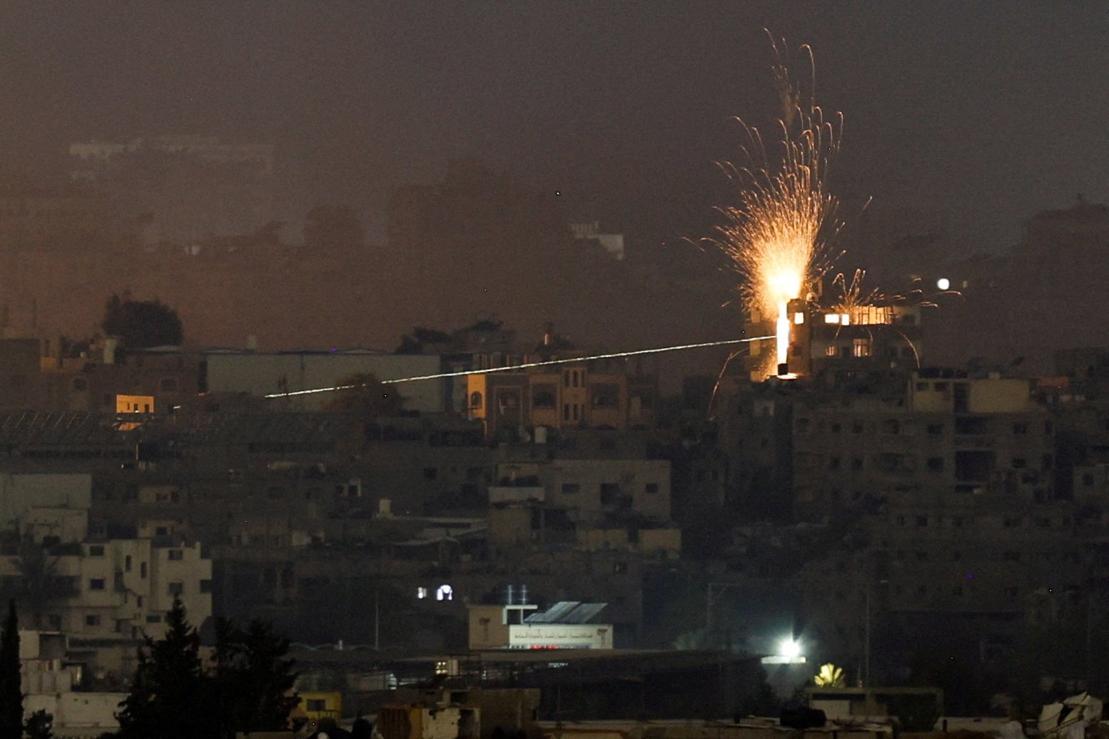 A missile hits a building in northern Gaza, amid the ongoing conflict between Israel and Hamas. Photo: Reuters
