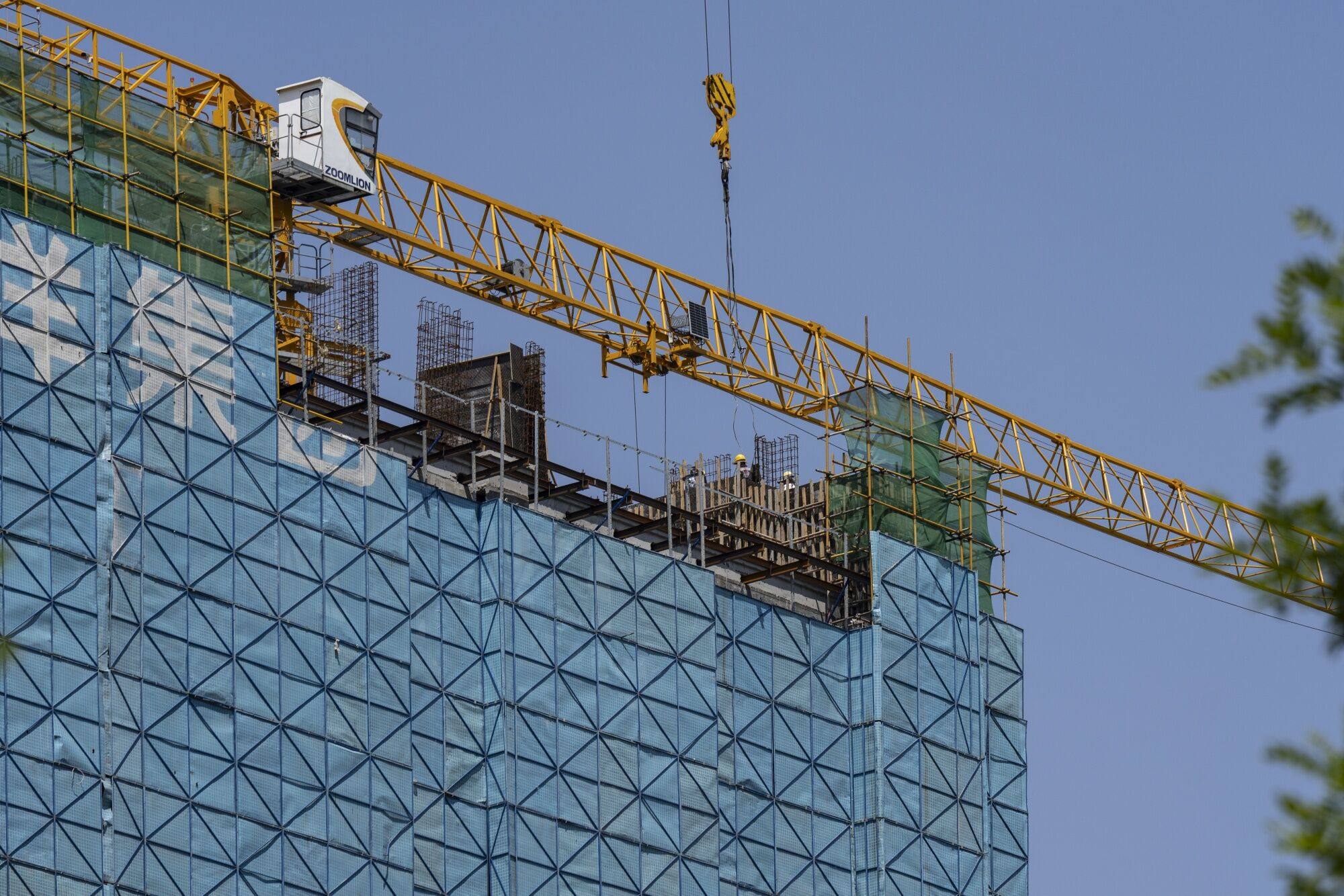 A residential building under construction in Jinan, China. Photo: Bloomberg