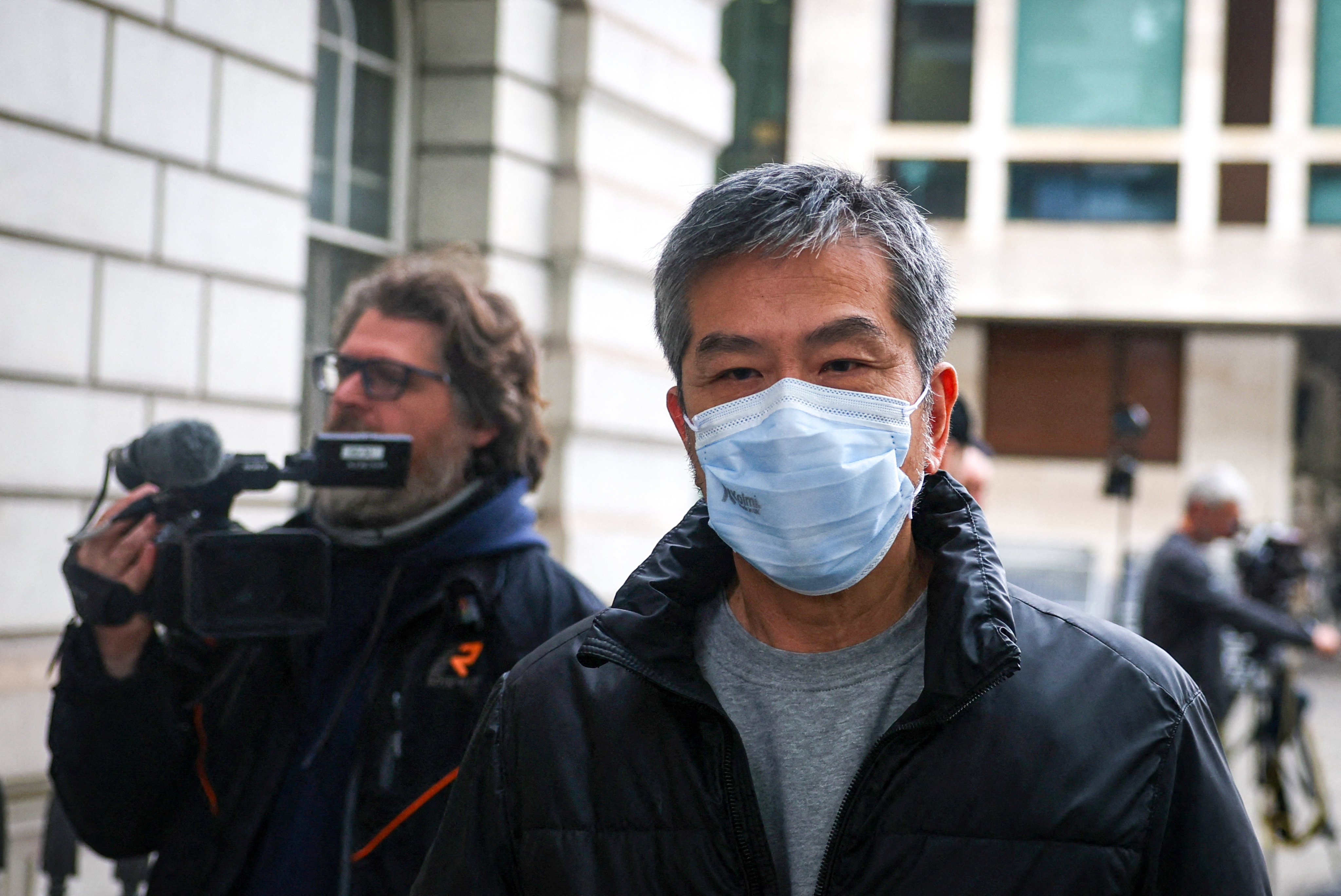 Bill Yuen of the Hong Kong Economic and Trade Office in London, leaves Westminster Magistrates’ Court after being charged over spying allegations. Photo: Reuters