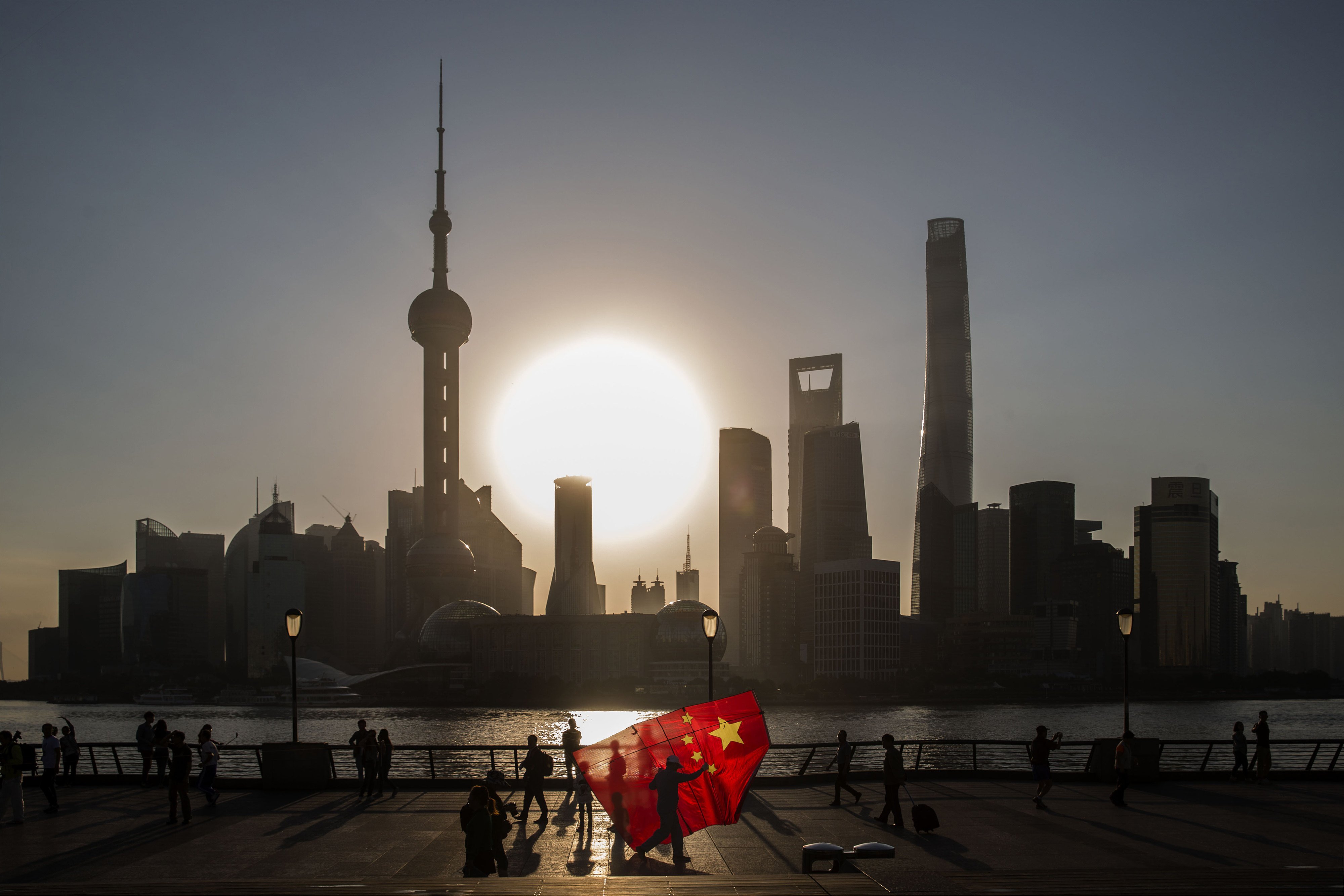 Shanghai’s Lujiazui financial district seen across the Huangpu River from the Bund. “In some months, our flights to and from Shanghai have been operating around half-full,” said the CEO of Qantas International. Photo: Bloomberg
