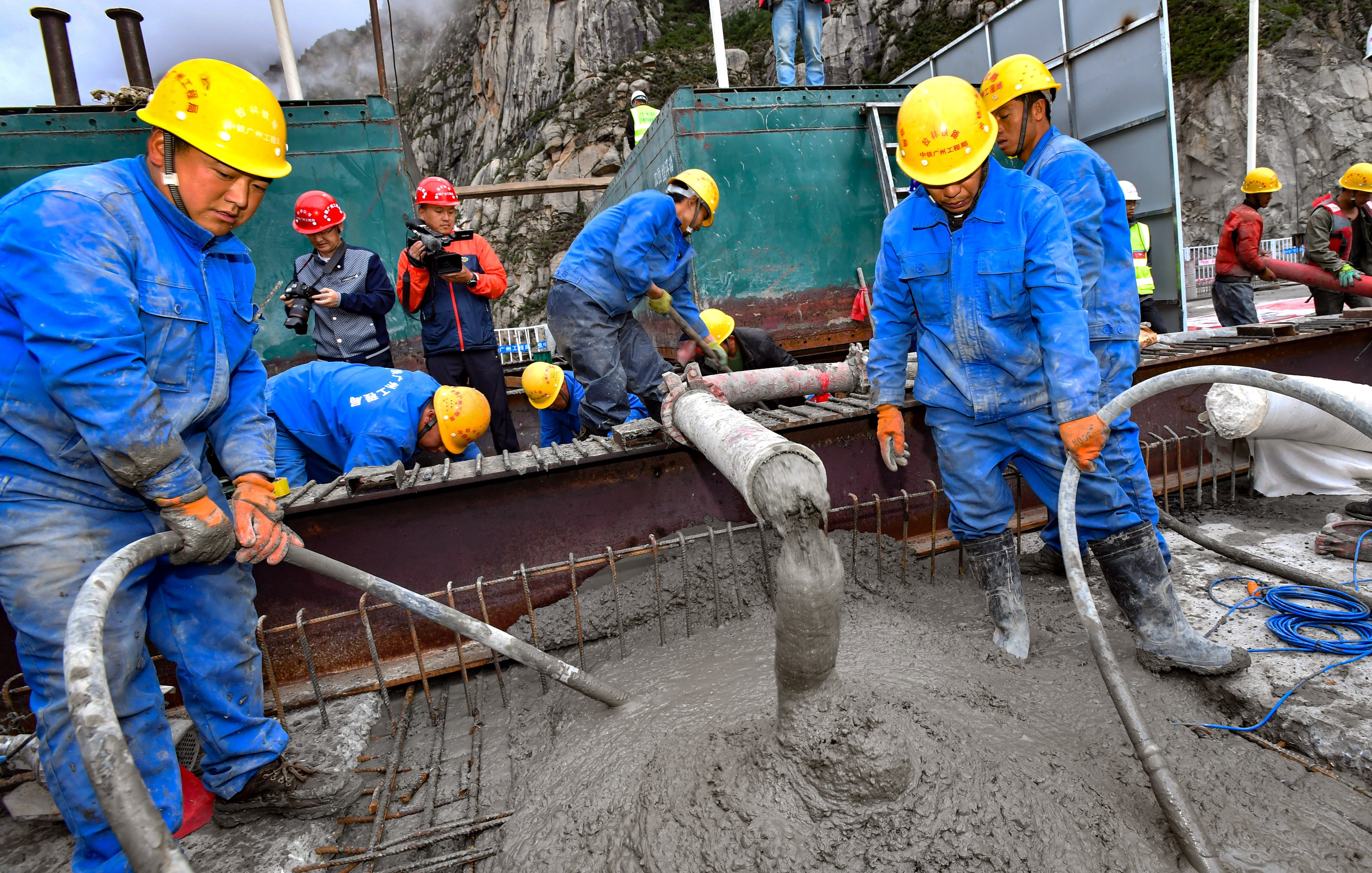 Concrete is poured during construction of a bridge across the Yarlung Zangbo river in southwest China’s Tibet autonomous region in June 2020. China’s cement sector needs to urgently cut emissions. Photo: Xinhua