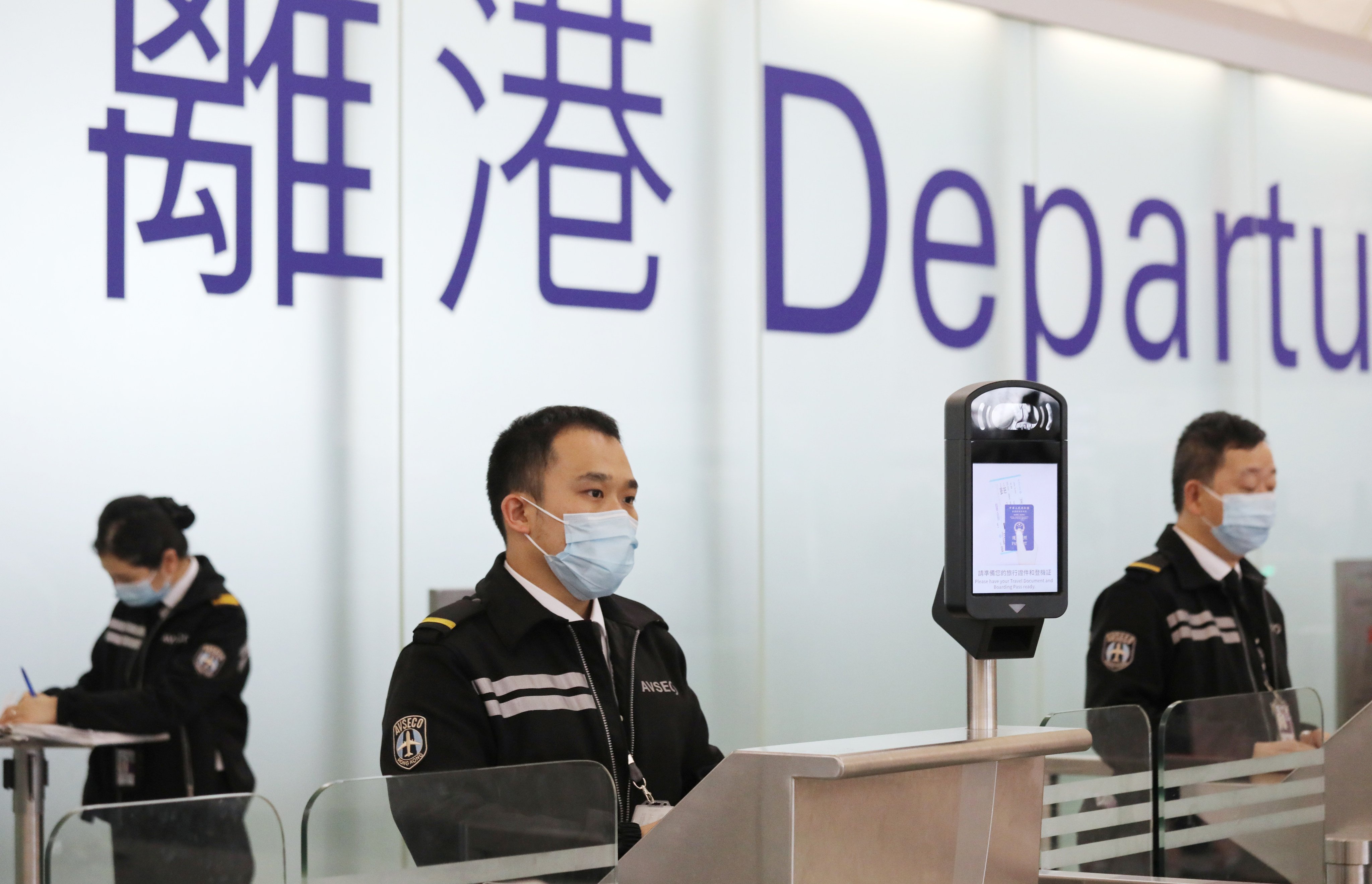 Staff at the Hong Kong International Airport. A security fee for passengers flying out of Hong Kong will be raised from HK$55 to HK$65 starting i mJanuary 2025. Photo: Dickson Lee