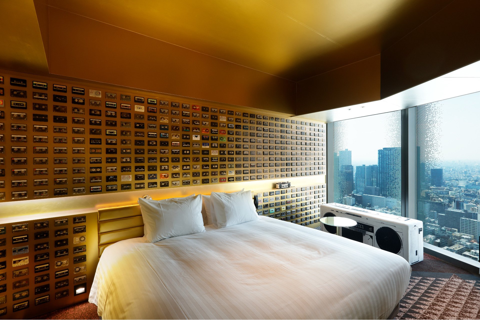 A music-themed room at Hotel Groove in Tokyo features cassette tapes on the wall. It was designed in collaboration with artist Yoshiaki Kaihatsu. Photo: Handout
