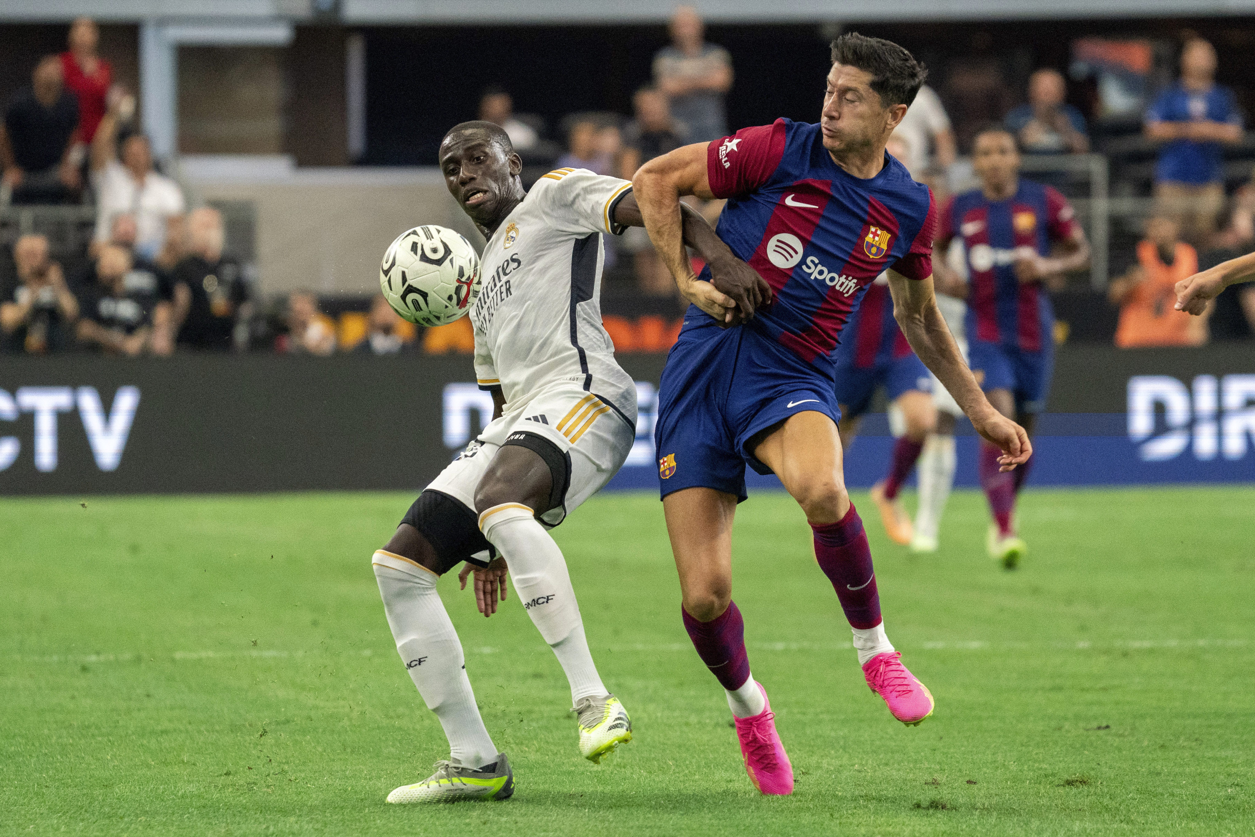 A Spanish league match such as that between Real Madrid and Barcelona could soon be held overseas, and not just as preseason friendlies such as this one in Arlington, Texas last year. Photo: AP