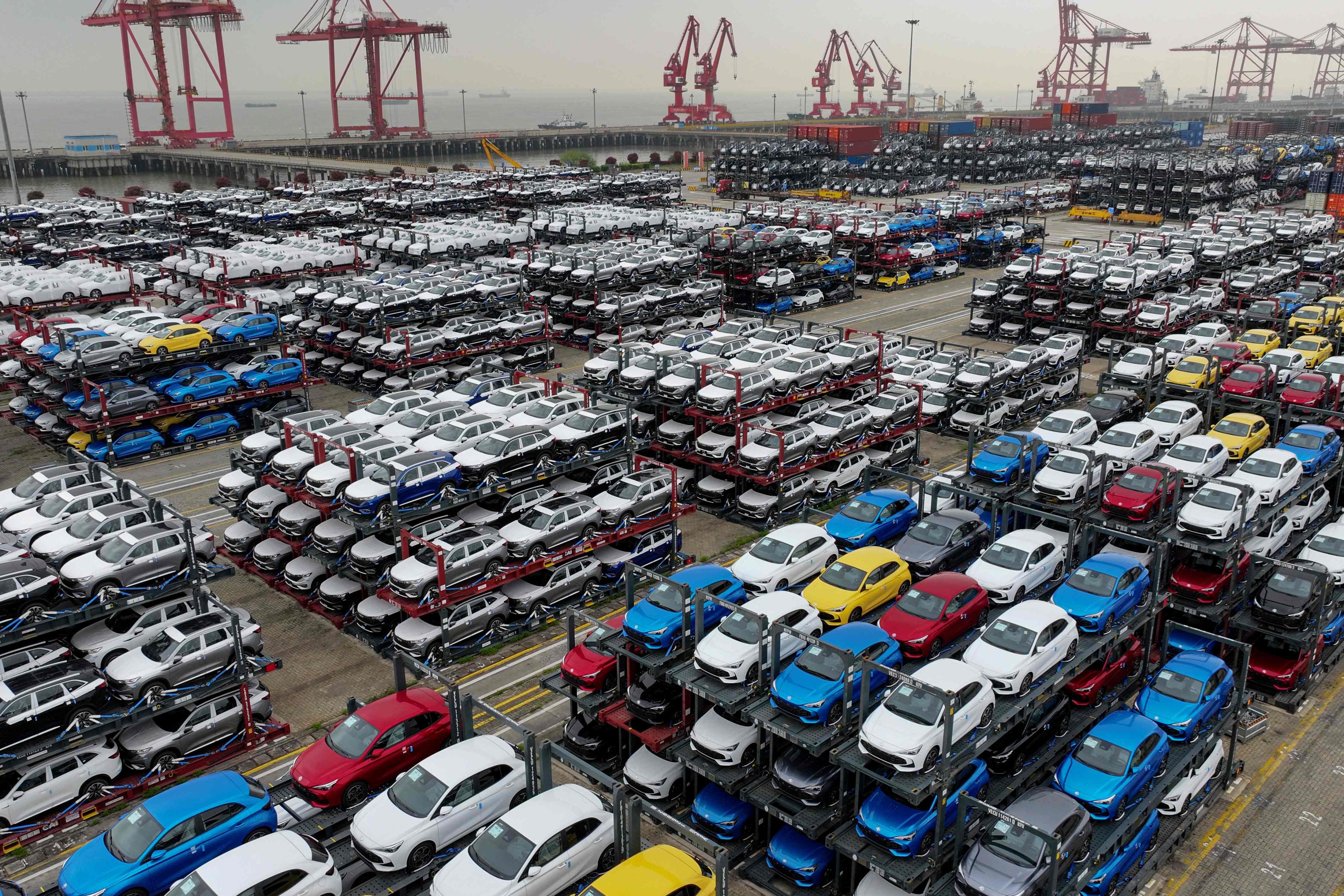 Electric cars for export are stacked at the international container terminal of Taicang Port in Suzhou, China. Photo: AFP