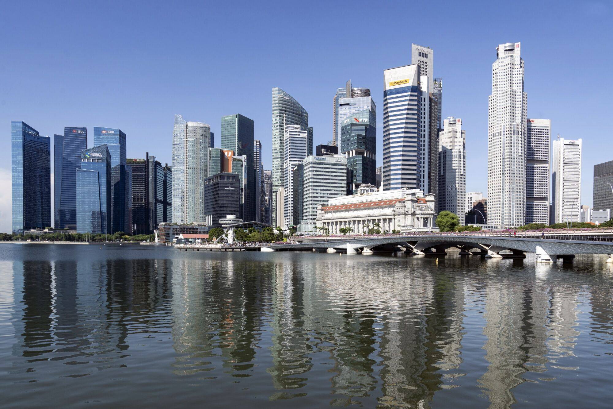 Singapore’s skyline. A man was jailed for sending sexually threatening emails to his ex-employer. Photo: Bloomberg