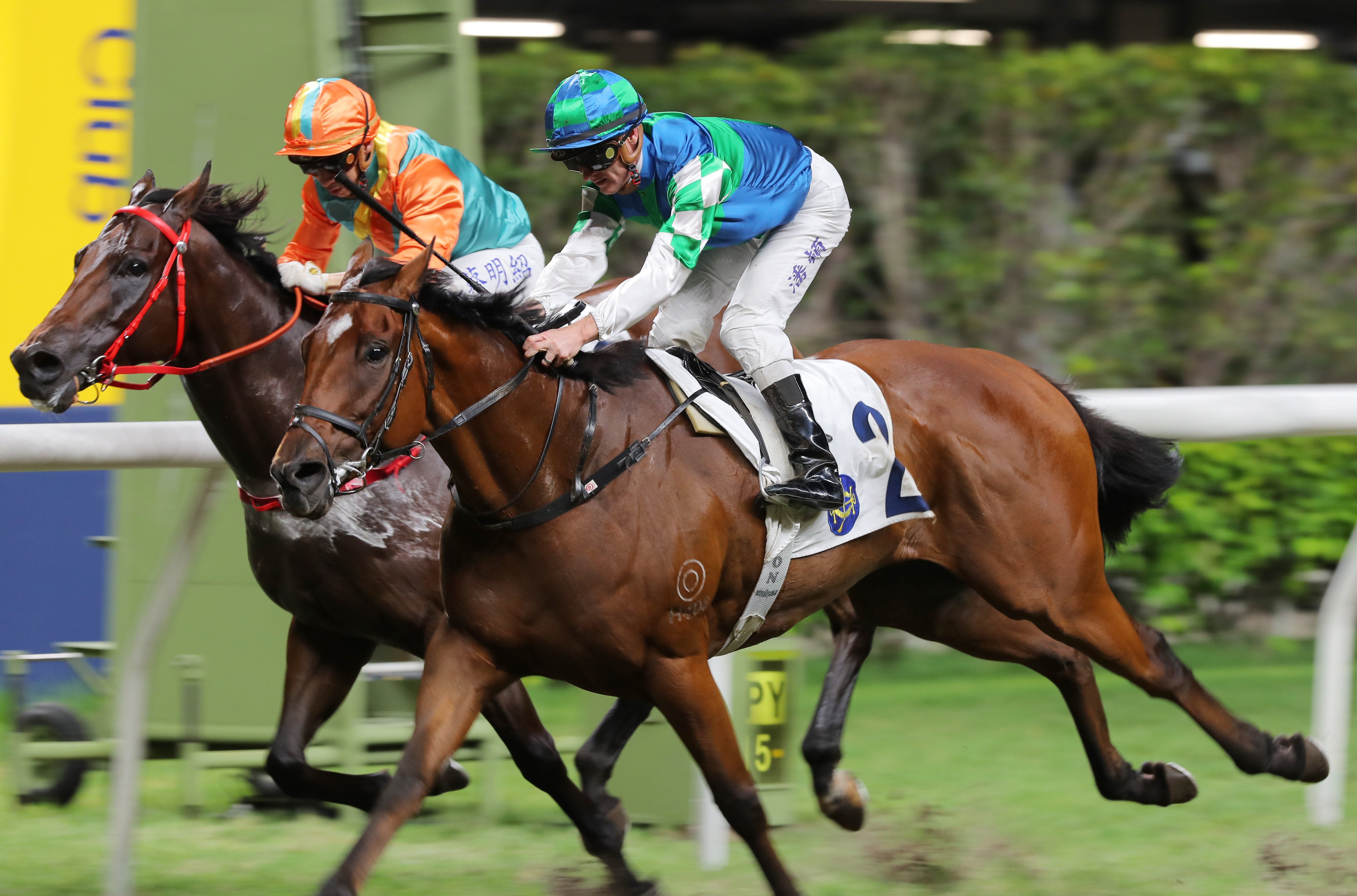 Zac Purton steers Copartner Prance (outside) home over California Touch at Happy Valley. Photos: Kenneth Chan