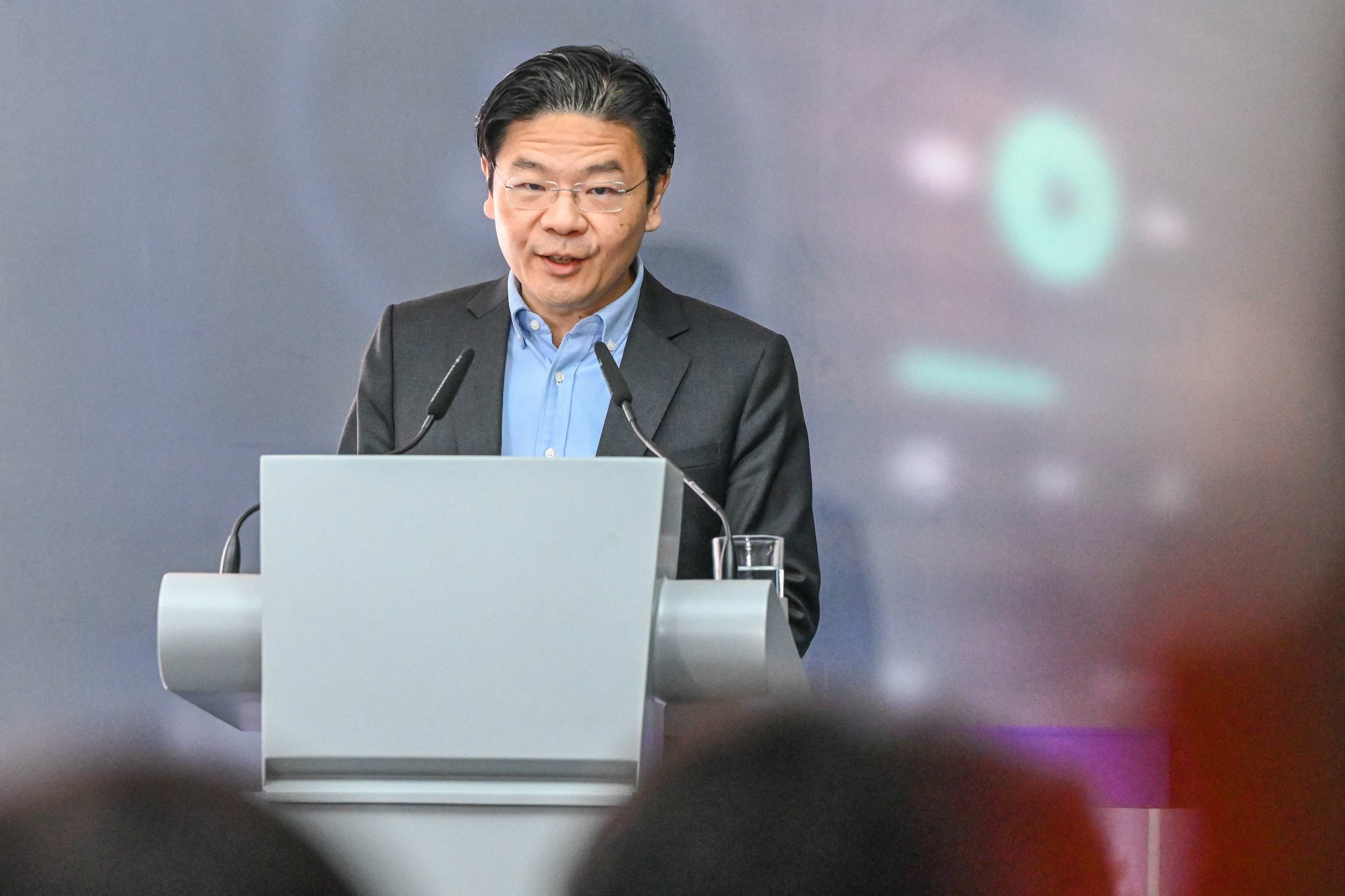 Singapore’s incoming Prime Minister Lawrence Wong delivers a speech last year. Photo: AFP