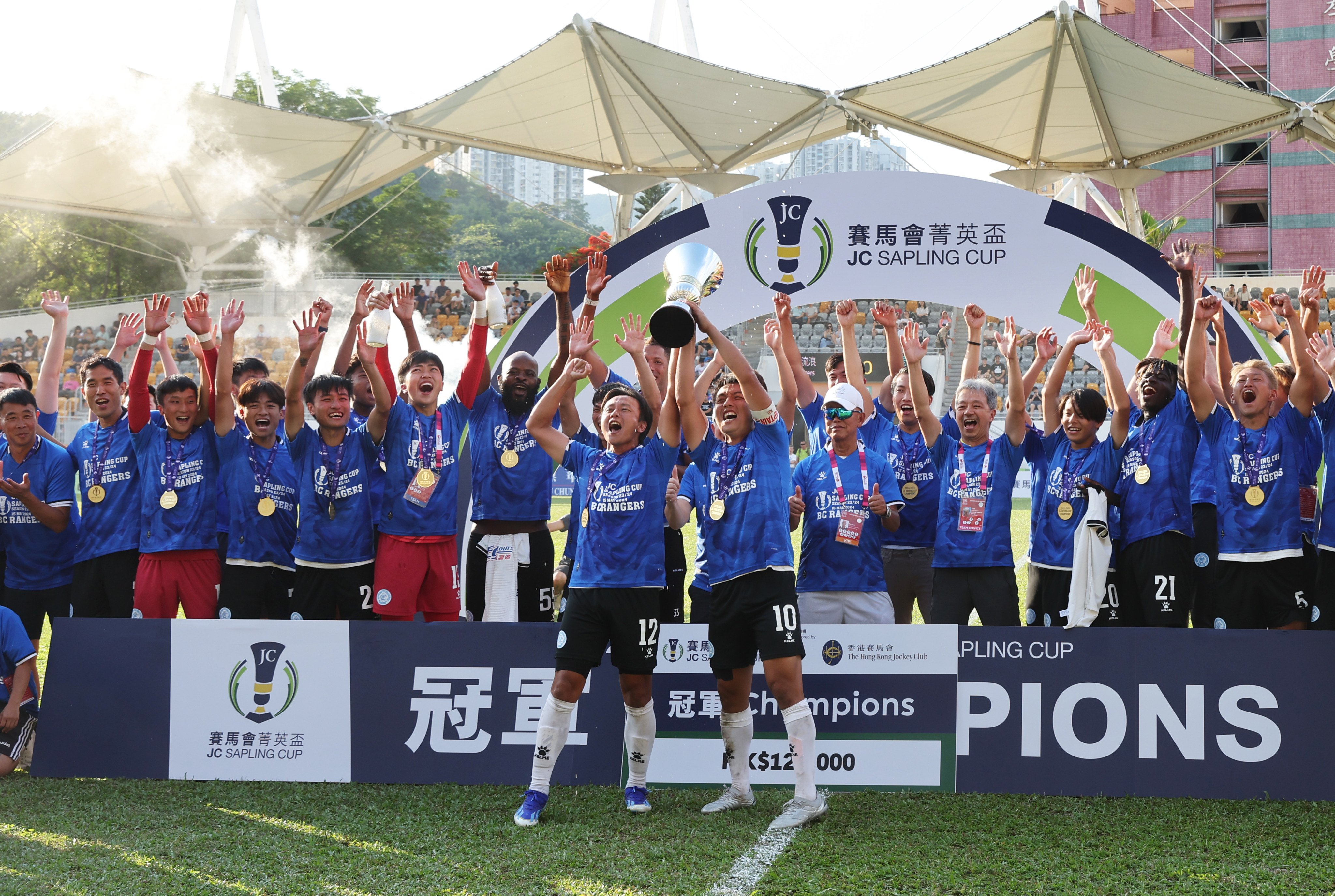 BC Rangers celebrate after beating Kitchee to win the JC Sapling Cup in Mong Kok Stadium. It was their first trophy since 1995. Photo: SCMP/Edmond So