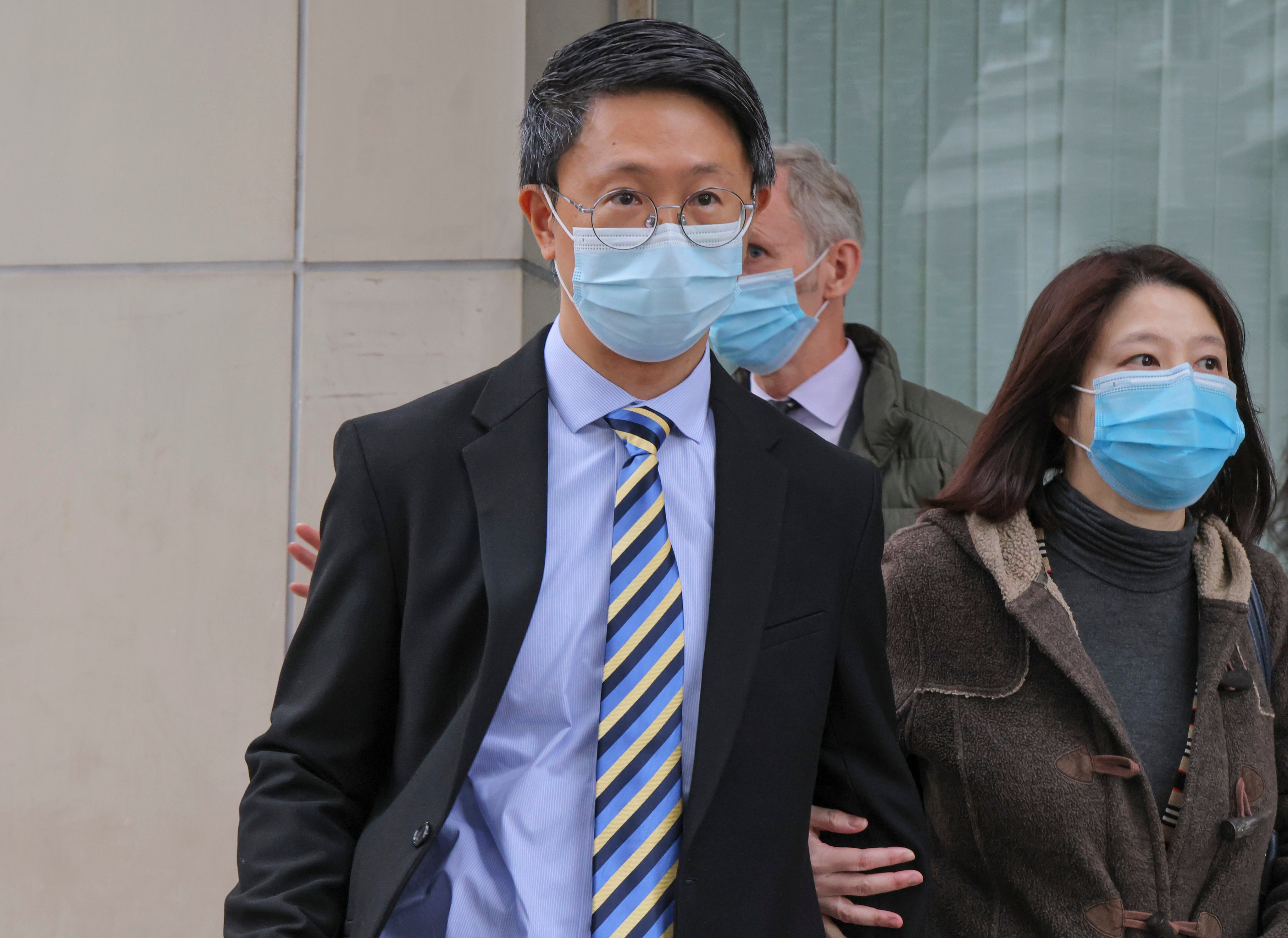 Lam Chi-kwan (middle), a doctor at United Christian Hospital, leaves the Eastern court in Sai Wan Ho in January 2023. He and fellow doctor Chan Siu-kim, had been charged with manslaughter over the death of Tang Kwai-sze, in 2017. Photo: Jelly Tse