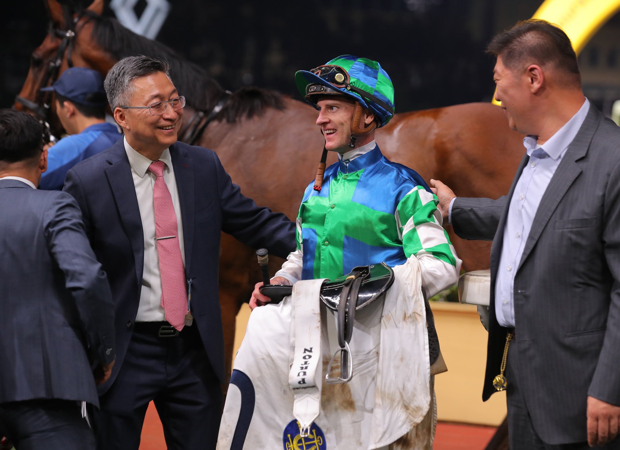 Francis Lui, Zac Purton and connections of Copartner Prance celebrate his Happy Valley win. Francis Lui, Zac Purton and connections of Copartner Prance celebrate his Happy Valley win.