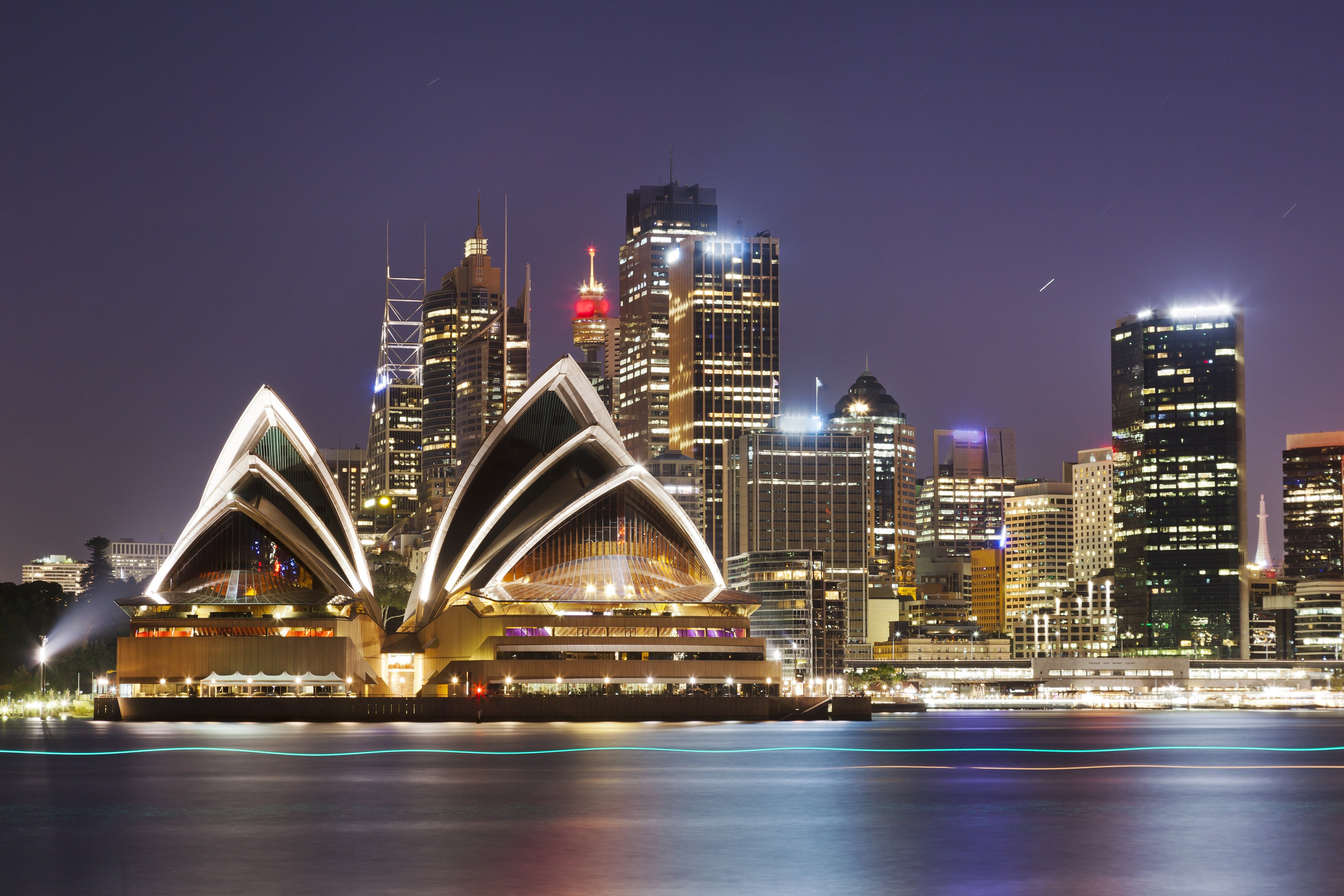 The Sydney Opera House and central business district at night. Photo: Shutterstock