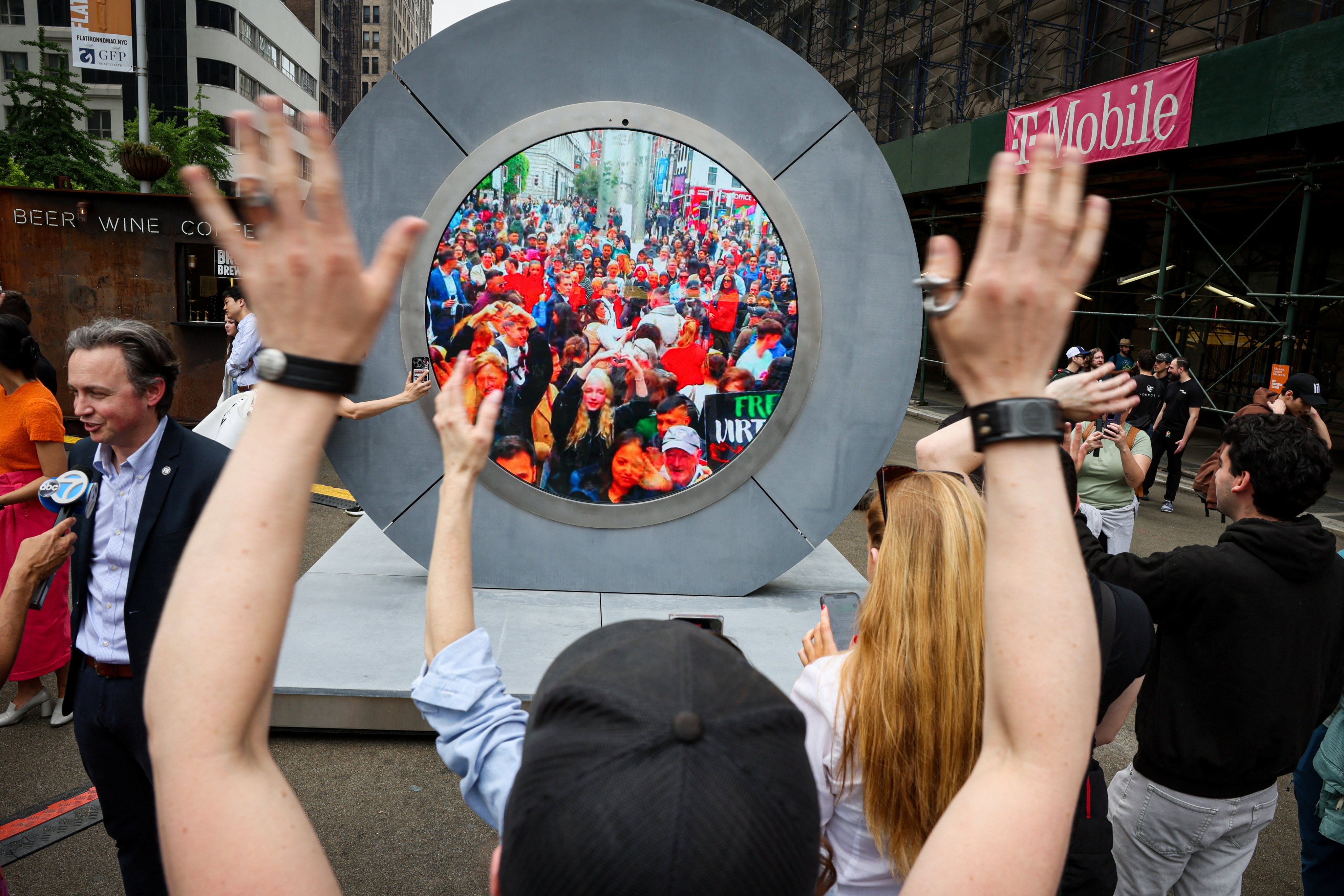 New Yorkers greet people in Dublin via a Portal in Manhattan. Photo: Reuters