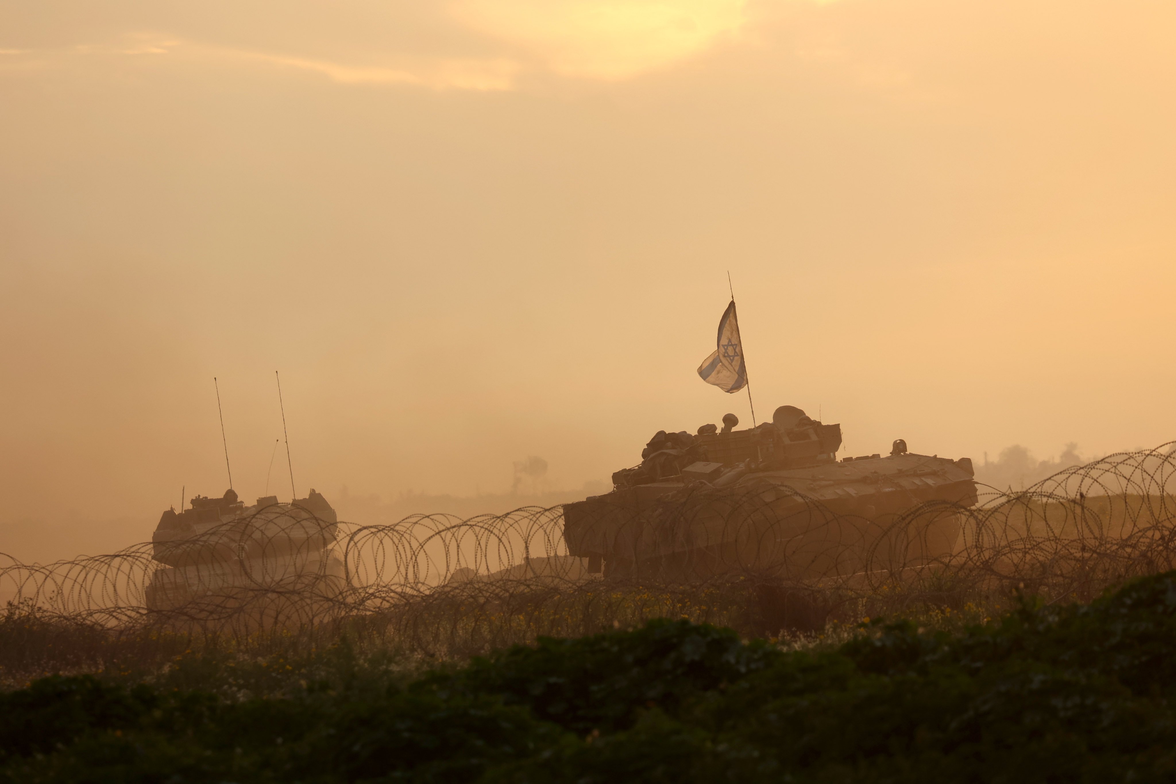 Israeli tanks are seen near the border with Gaza Strip. Photo: Xinhua