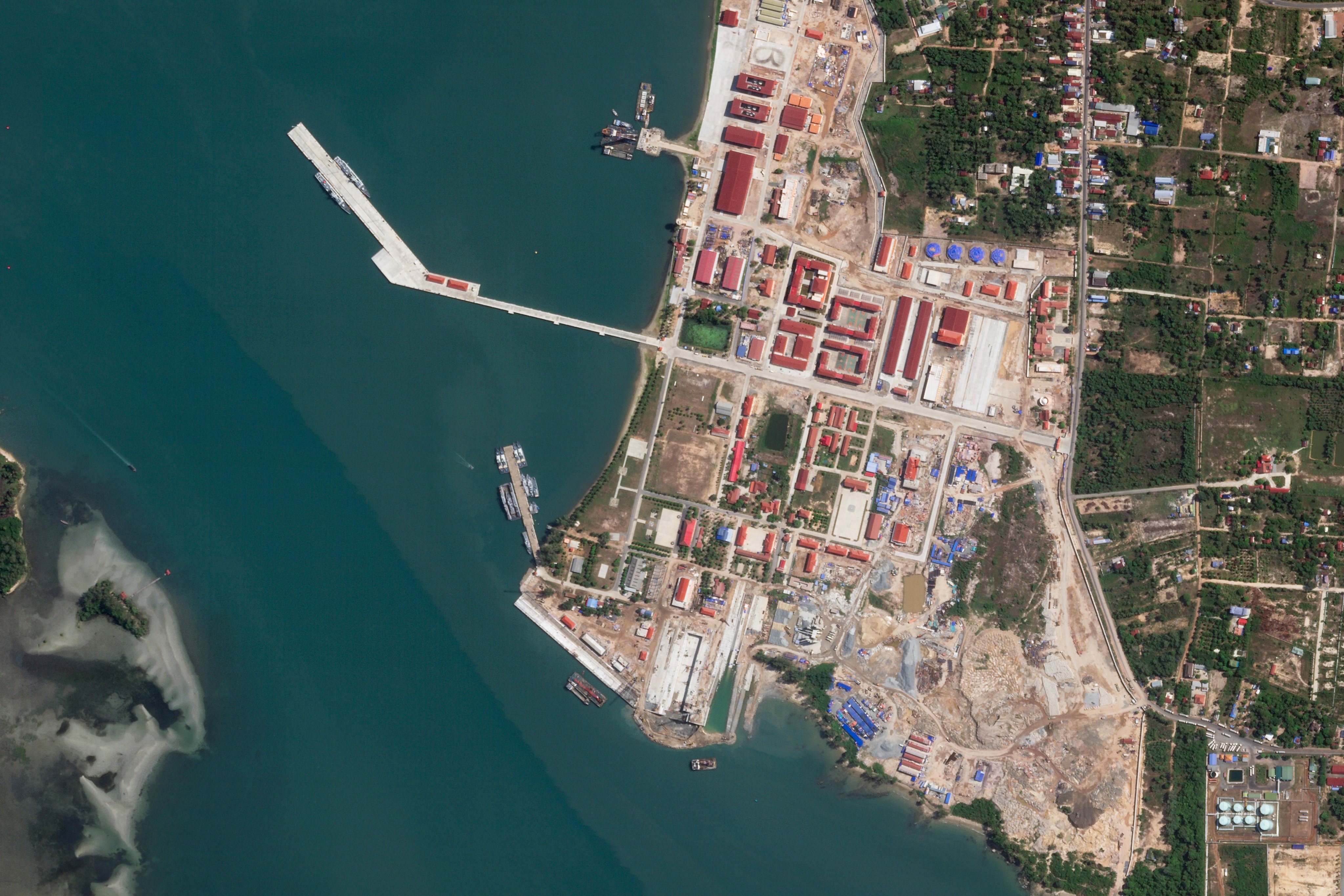 A satellite photo taken on May 8 shows two Chinese corvettes (top left) docked at Cambodia’s Ream Naval Base on the Gulf of Thailand. Photo: Planet Labs PBC via AP