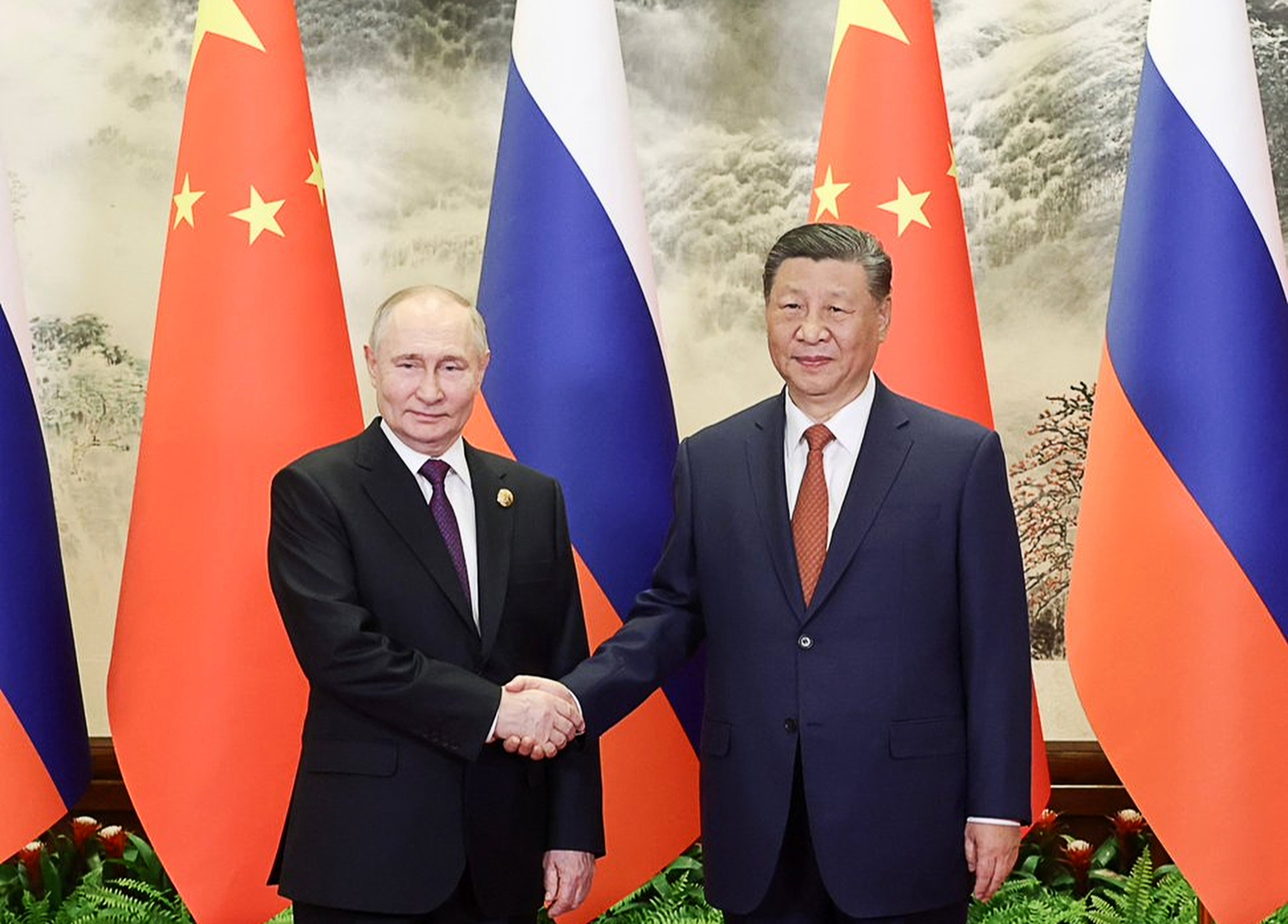 Russian President Vladimir Putin is welcomed to Beijing by China’s leader Xi Jinping. Photo: X/@SpokespersonCHN