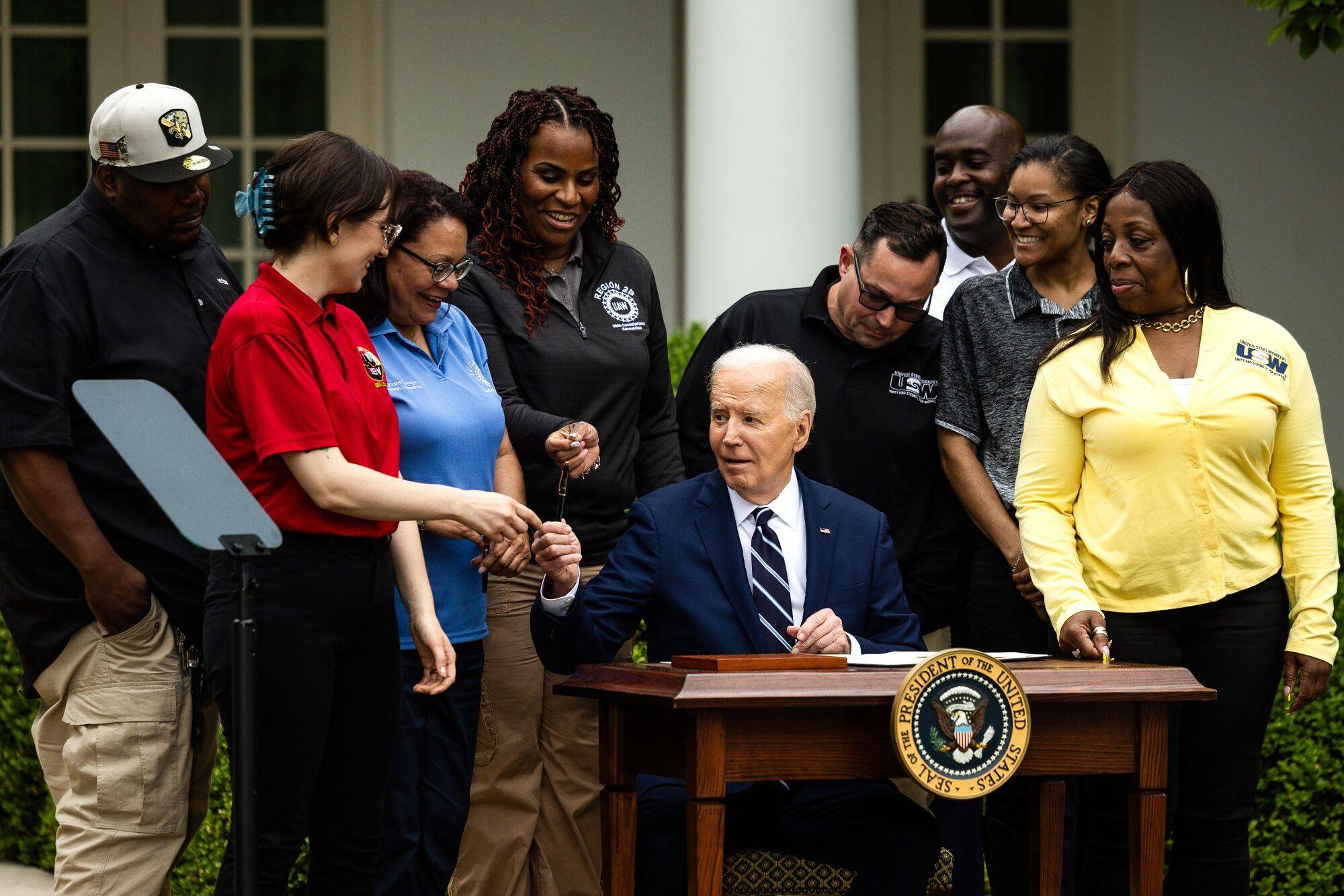 US President Joe Biden (centre) speaks to union workers after signing orders that increase tariffs on China during an event in the Rose Garden of the White House in Washington on May 14. Biden’s order raises tariffs on a wide range of Chinese imports, including semiconductors, batteries, solar cells and critical minerals in an election-year bid to bolster domestic manufacturing in critical industries. Photo: Bloomberg