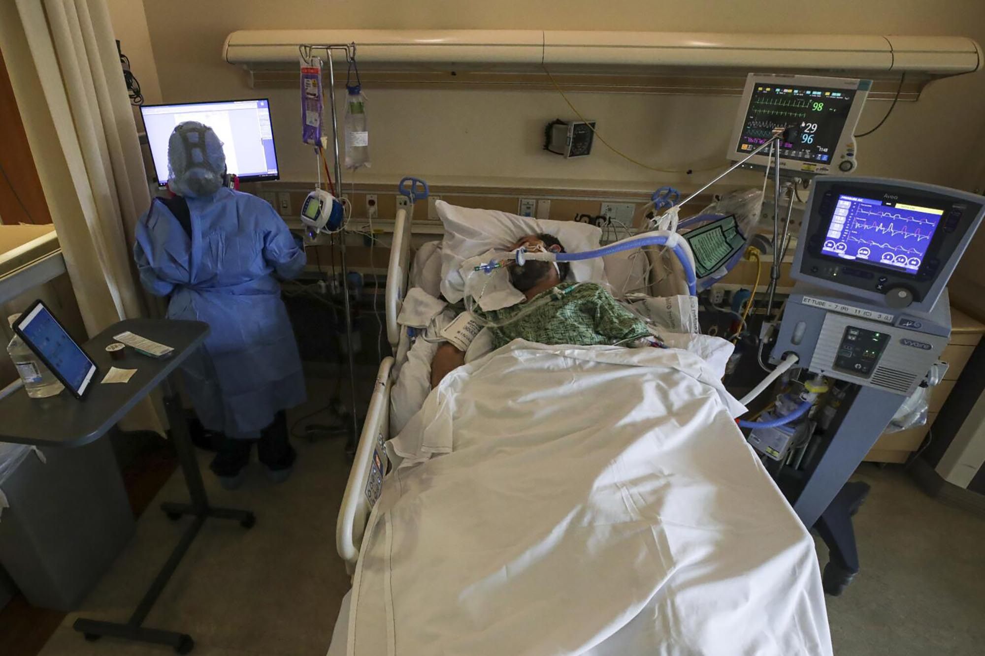 A hospital worker attends to a Covid-19 patient at St Jude Medical Centre in Fullerton, California. Photo: TNS