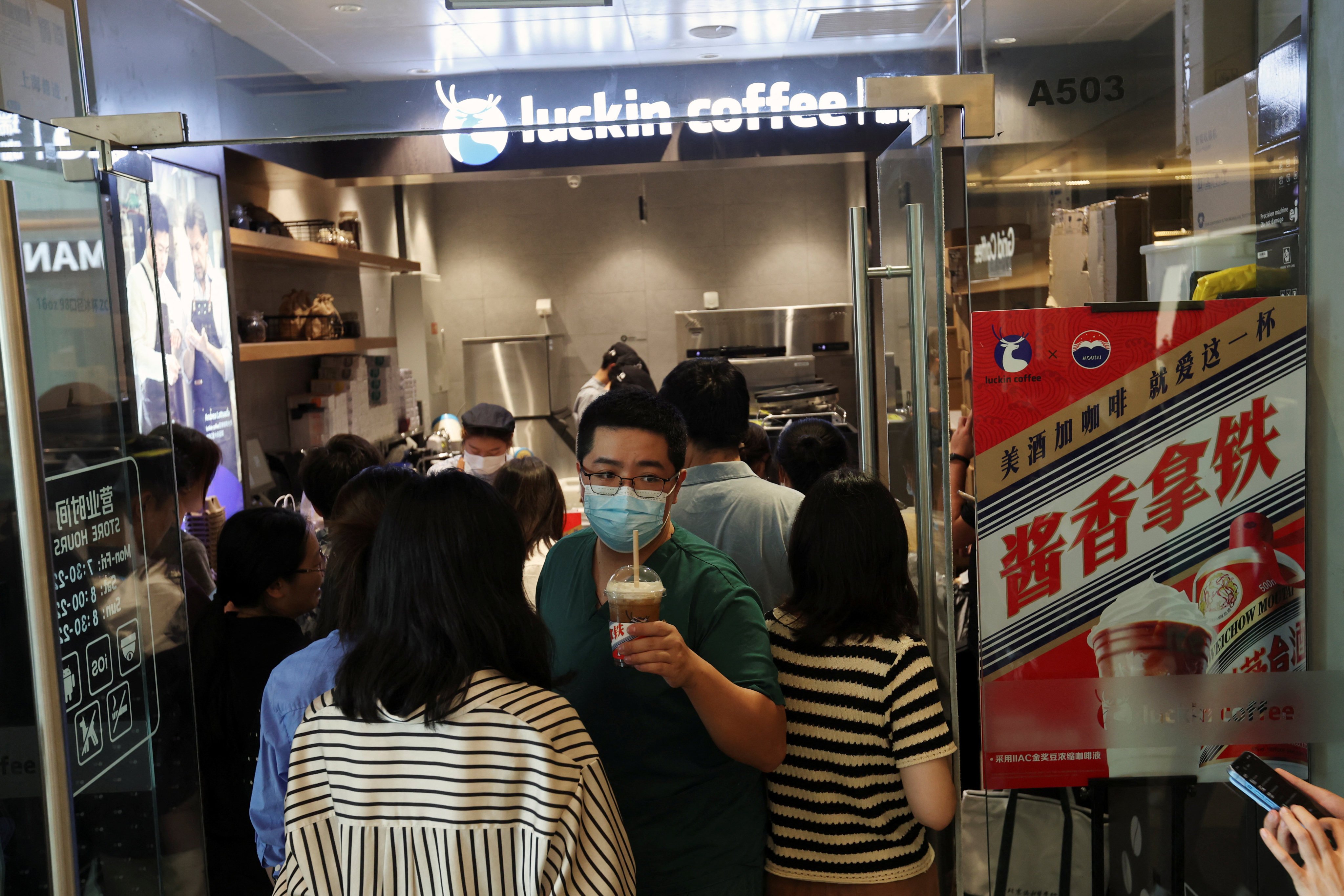 A Luckin Coffee store in Beijing promoting its Kweichow Moutai liquor-infused latte on September 4. The rise of local coffee chains reflects a broader trend of increasing consumer nationalism in China. Photo: Reuters